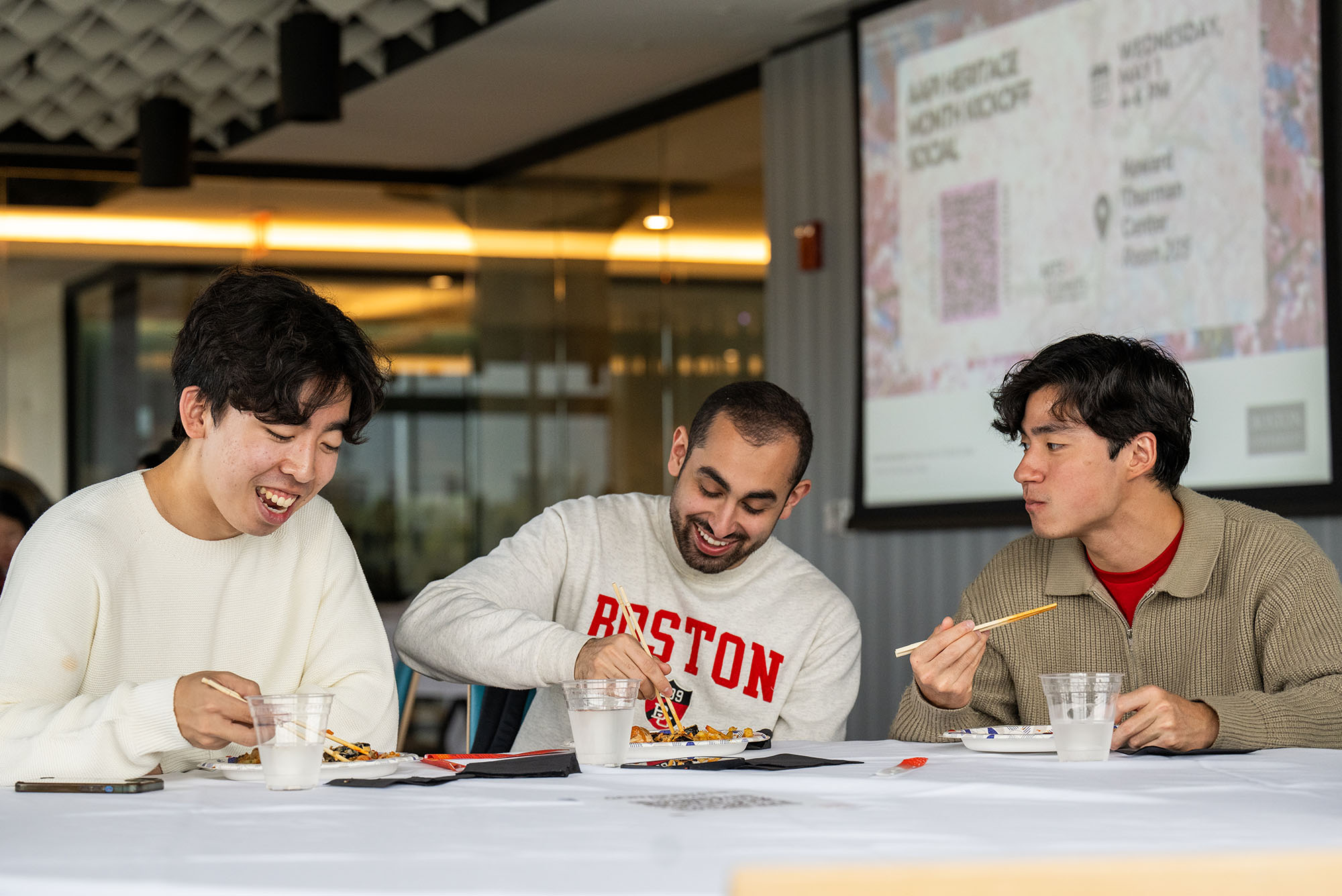 Photo: Sungmin Hwang (ENG’24), from left, Youssef Haider (ENG’24), and Aidan Chan (ENG’24) enjoy some Korean and Chinese cuisine ont he second floor of HTC May 1.