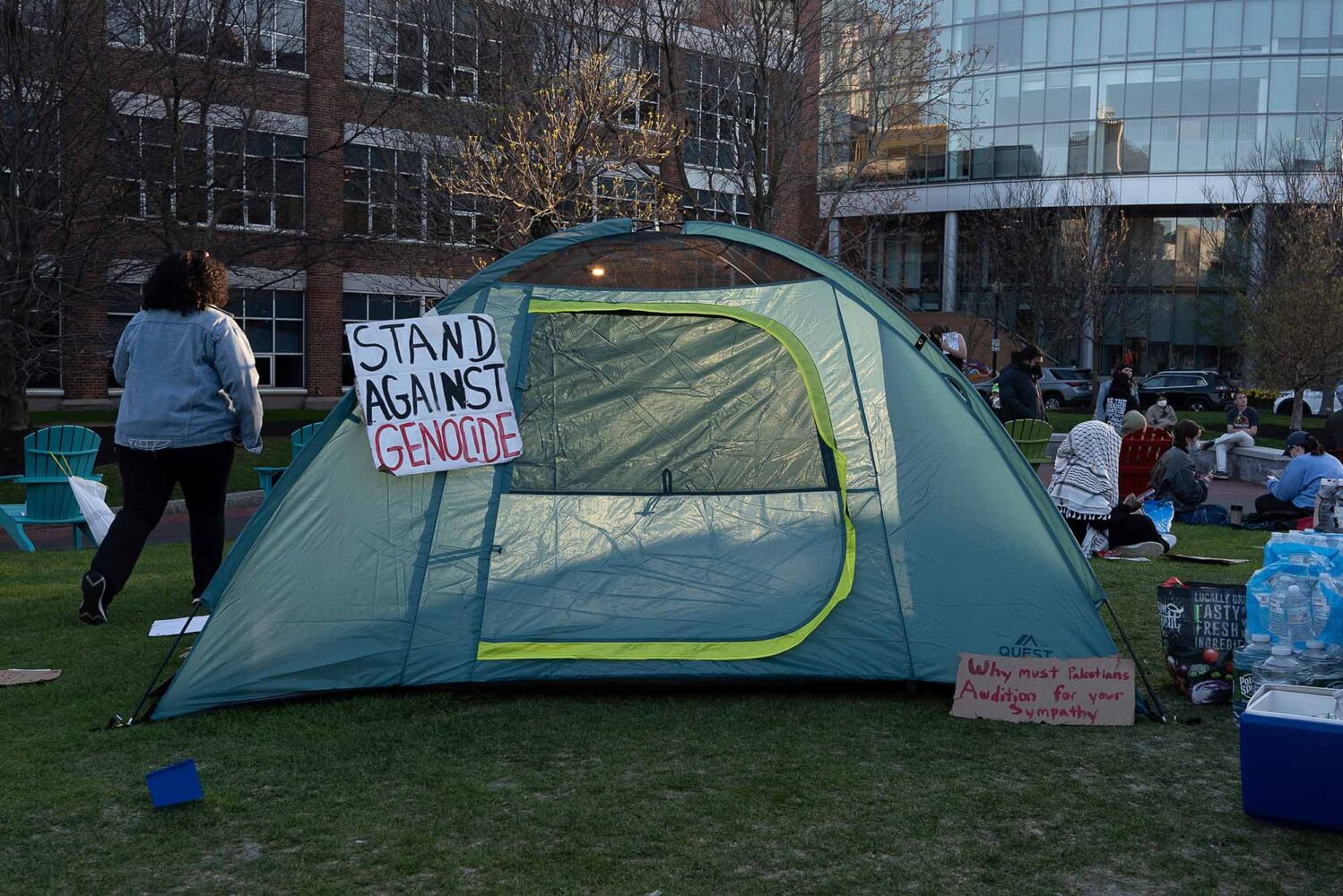 Photo: A picture of a tent with a sign on it that says "Stand Against Genocide."