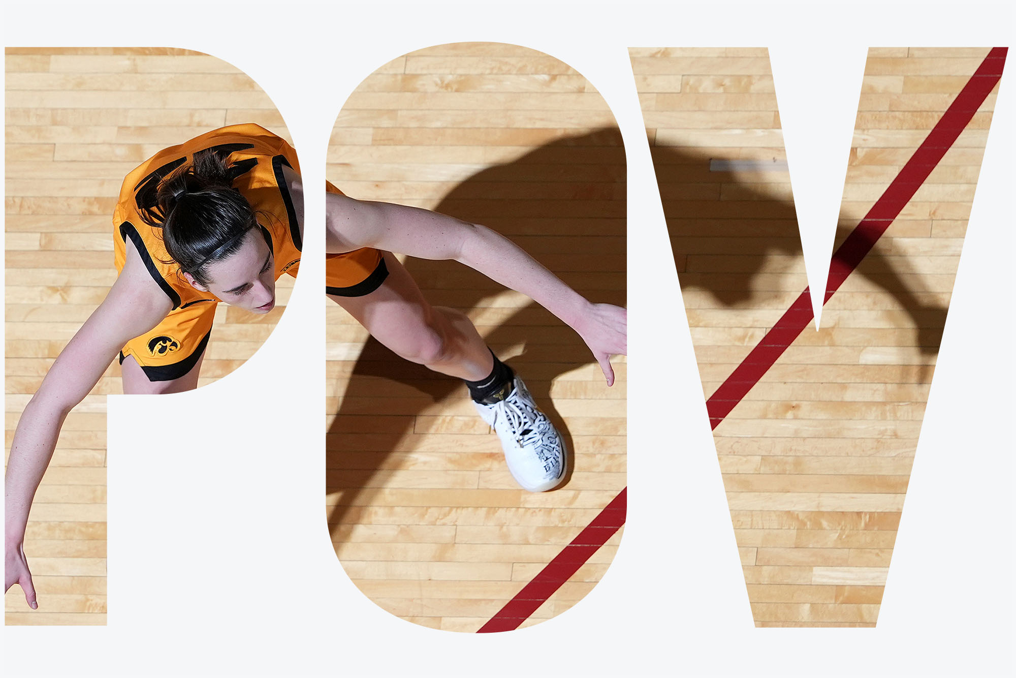 Photo: An aerial shot of a basketball player on the court. Image overlay has the letters "POV"