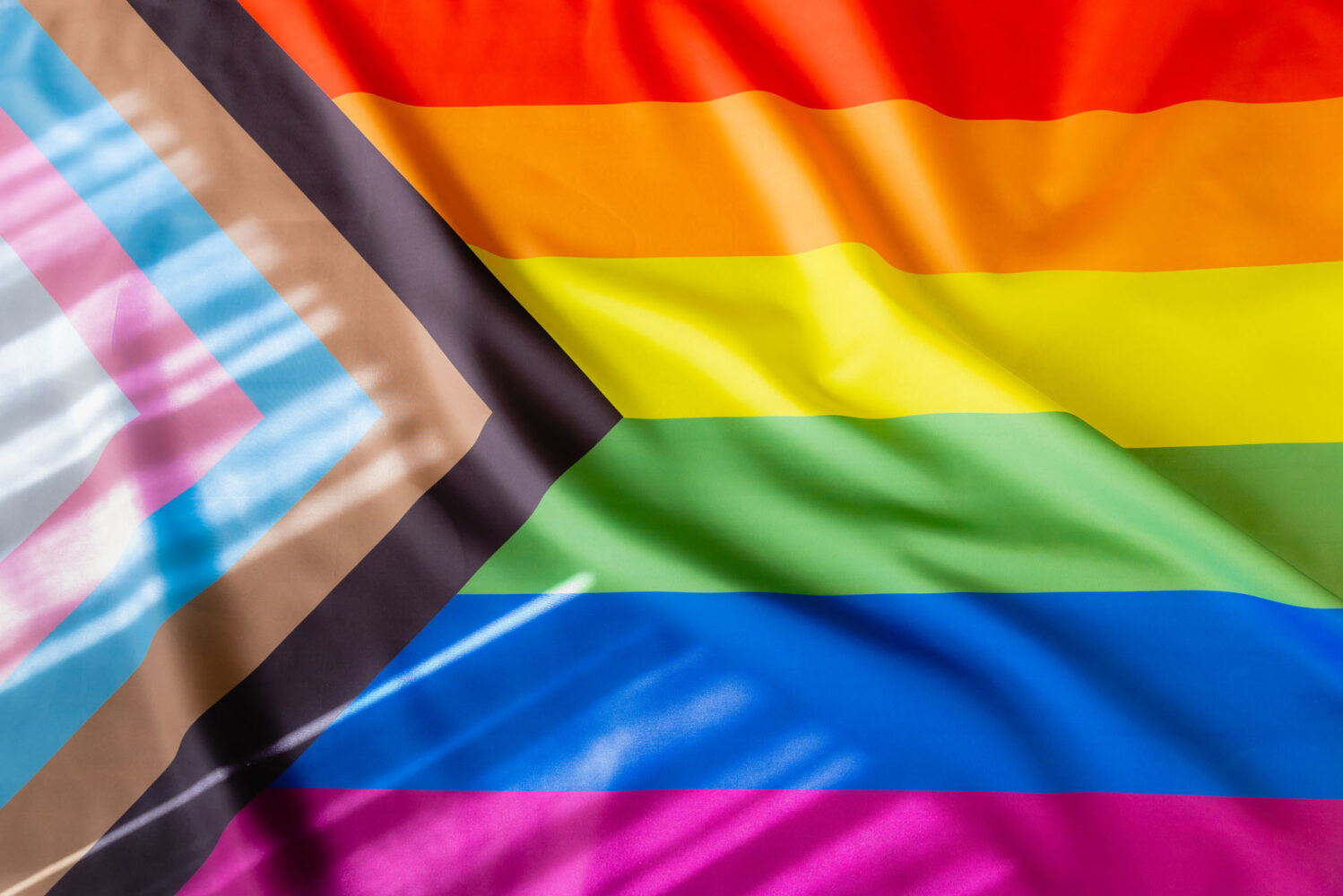 Photo: A picture of a pride flag with many vibrant colors