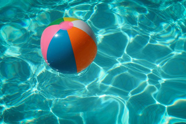 Photo: An inflatable beach ball floating in a pool