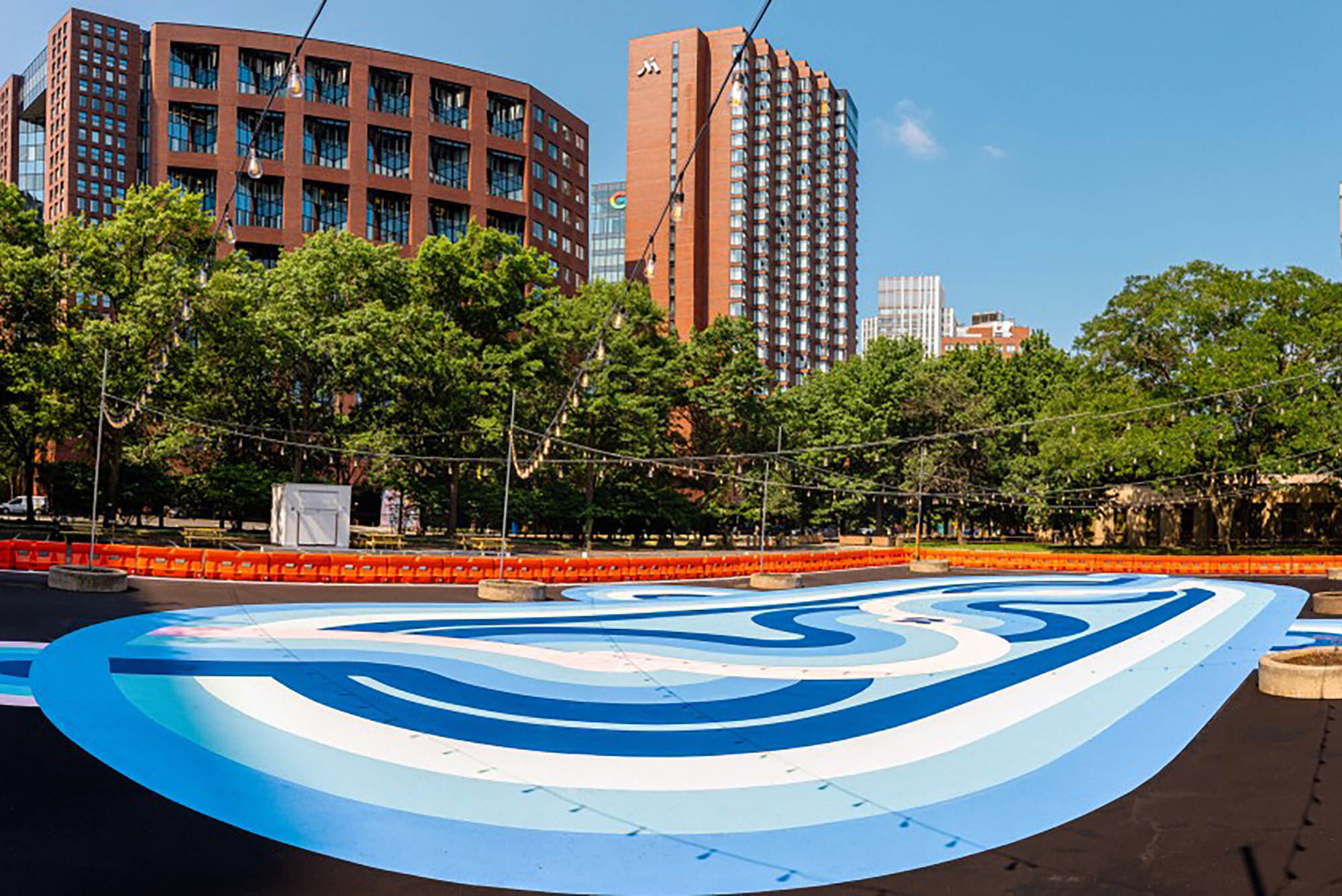 Photo: A wide shot of a makeshift, outdoor roller rink.