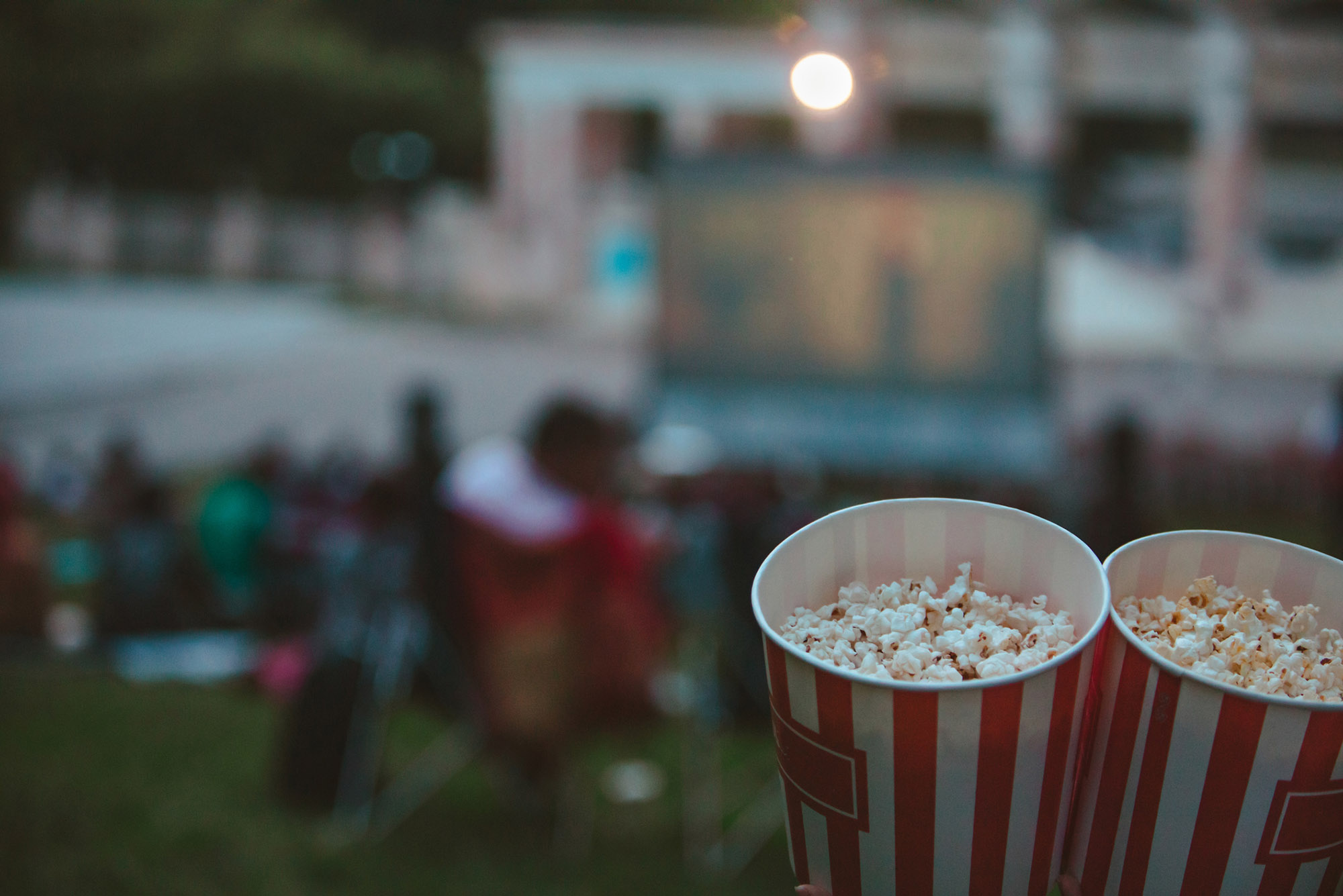 Photo: Two buckets of popcorn up close and to the bottom right hand side of the photo.