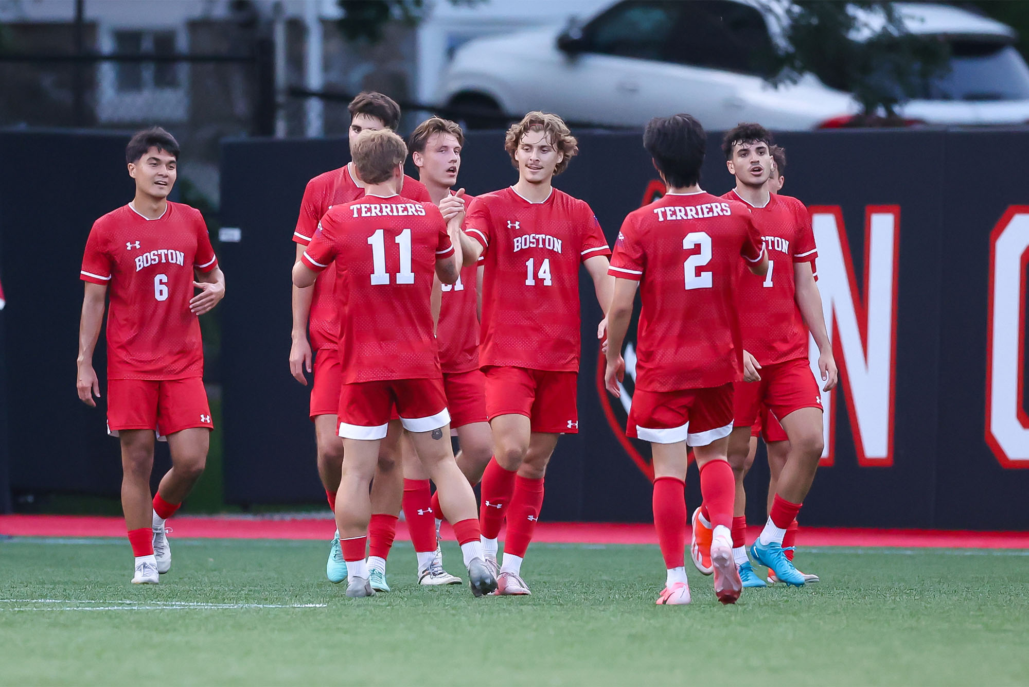 Congratulating Quin DeLaMater (CAS’26) after he scored his first career goal on August 27 against Northeastern at Parsons Field. The men’s team, coming off the Patriot League Championship, is also in search of its first win ahead of Patriot League play this weekend. Photo by Jim Pierce/BU Athletics