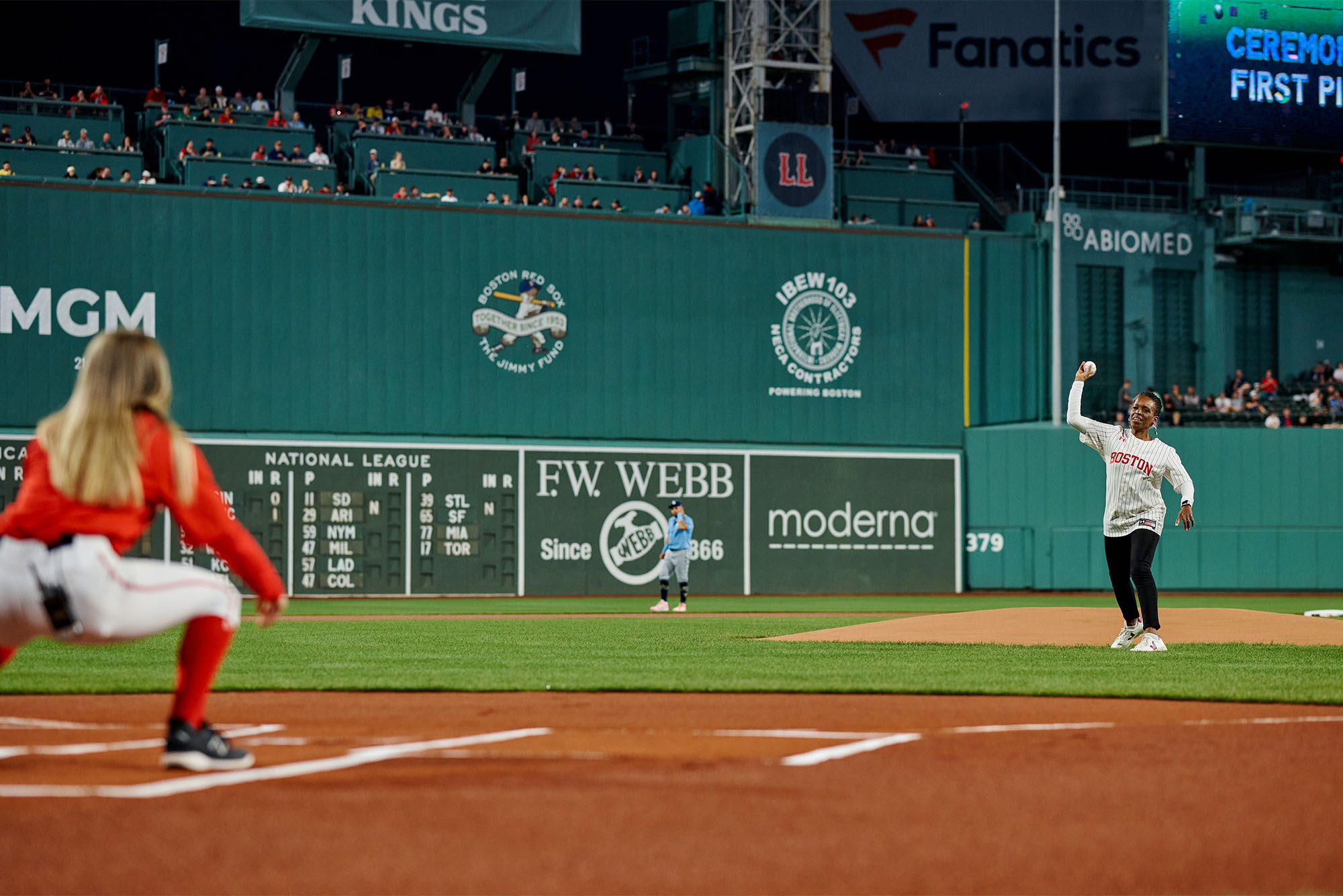 Photo: Melissa L Gilliam, Boston University's 11th president, throws out the first pitch at a recent Red Sox game at Fenway Park in Boston, MA