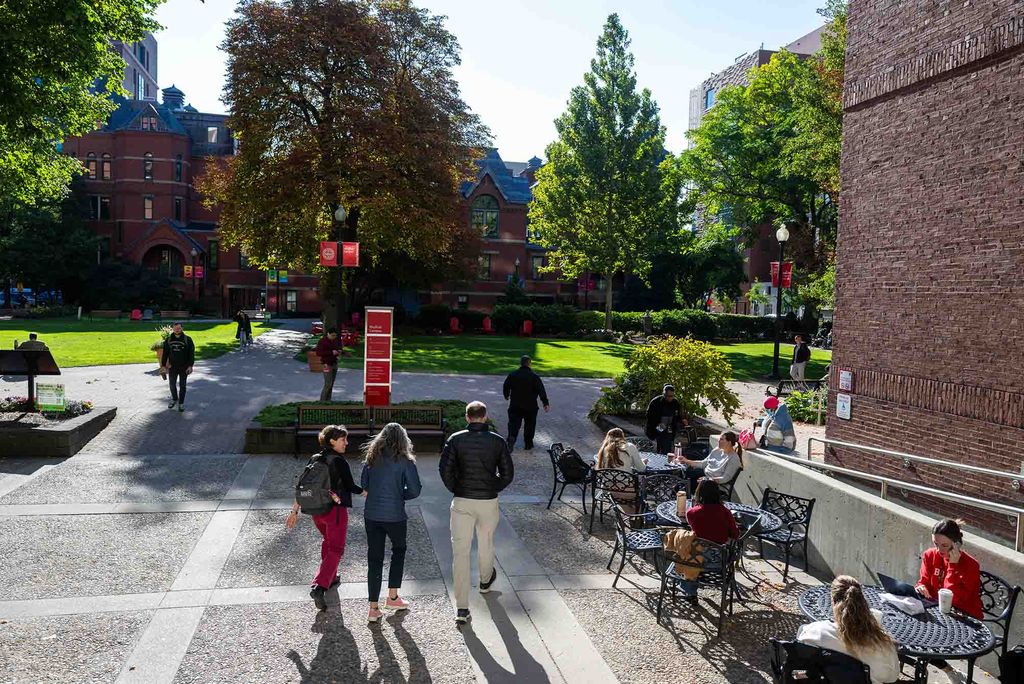 Photo: A group of people walking along BU's medical campus