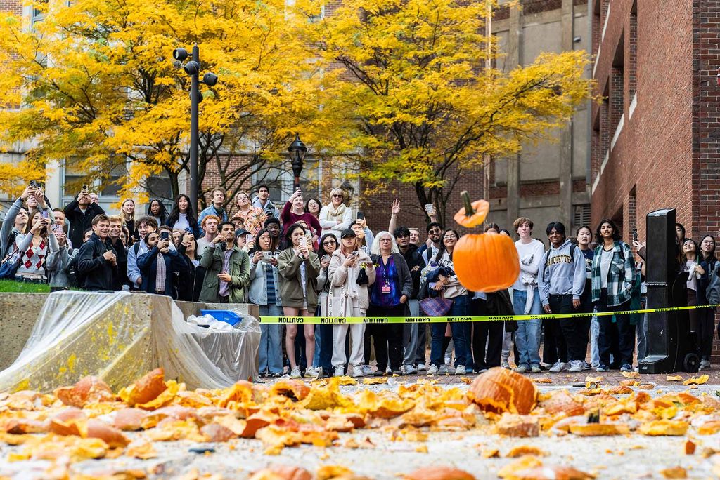 Photo: A picture of a pumpkin falling to the ground during BU's annual Pumpkin Drop