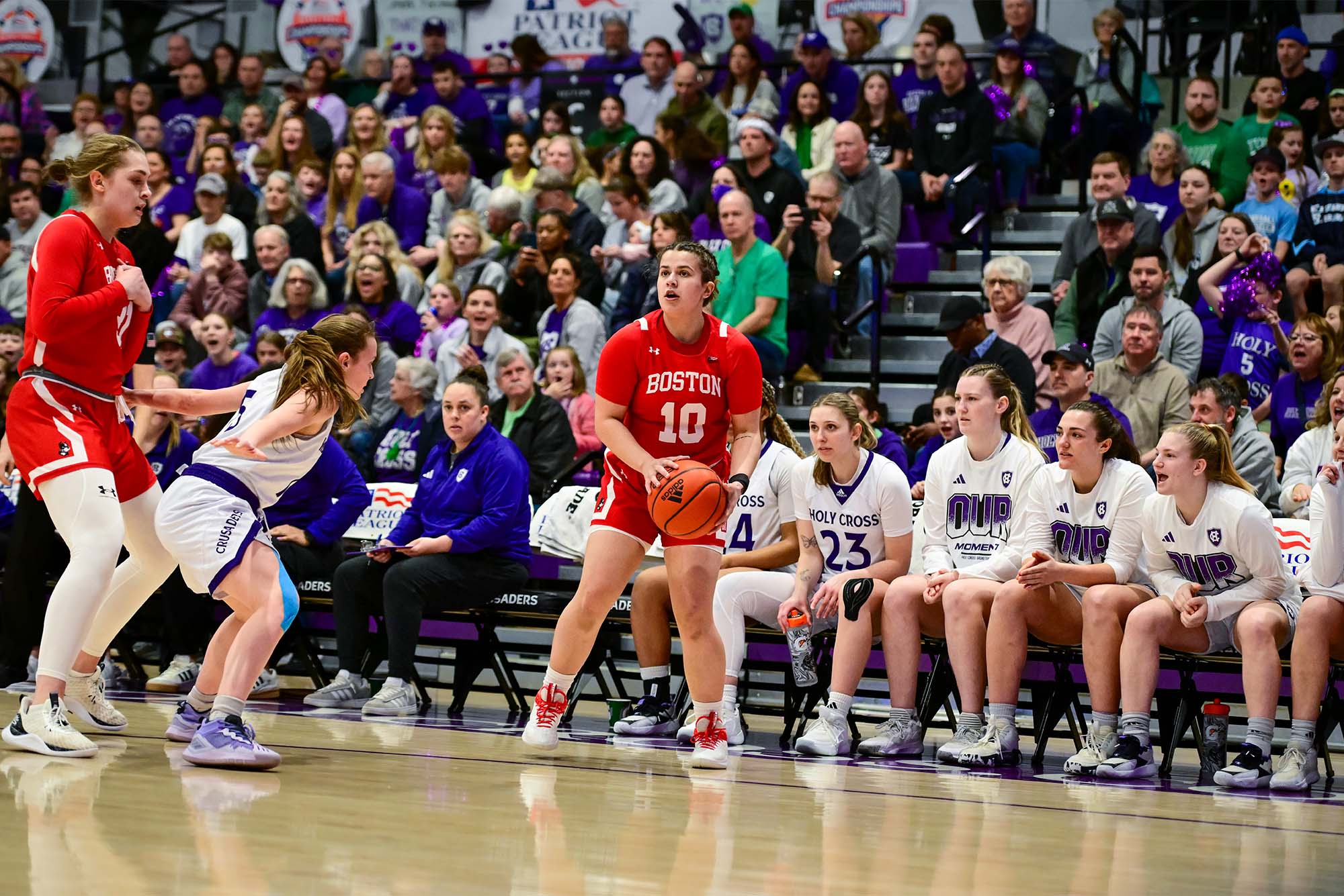 Photo: Captain Alex Giannaros (Wheelock'25) takes a shot in a game against Holy Cross on March 17. Giannaros says she is "tired of getting to the championship and not being able to get the result we want." 