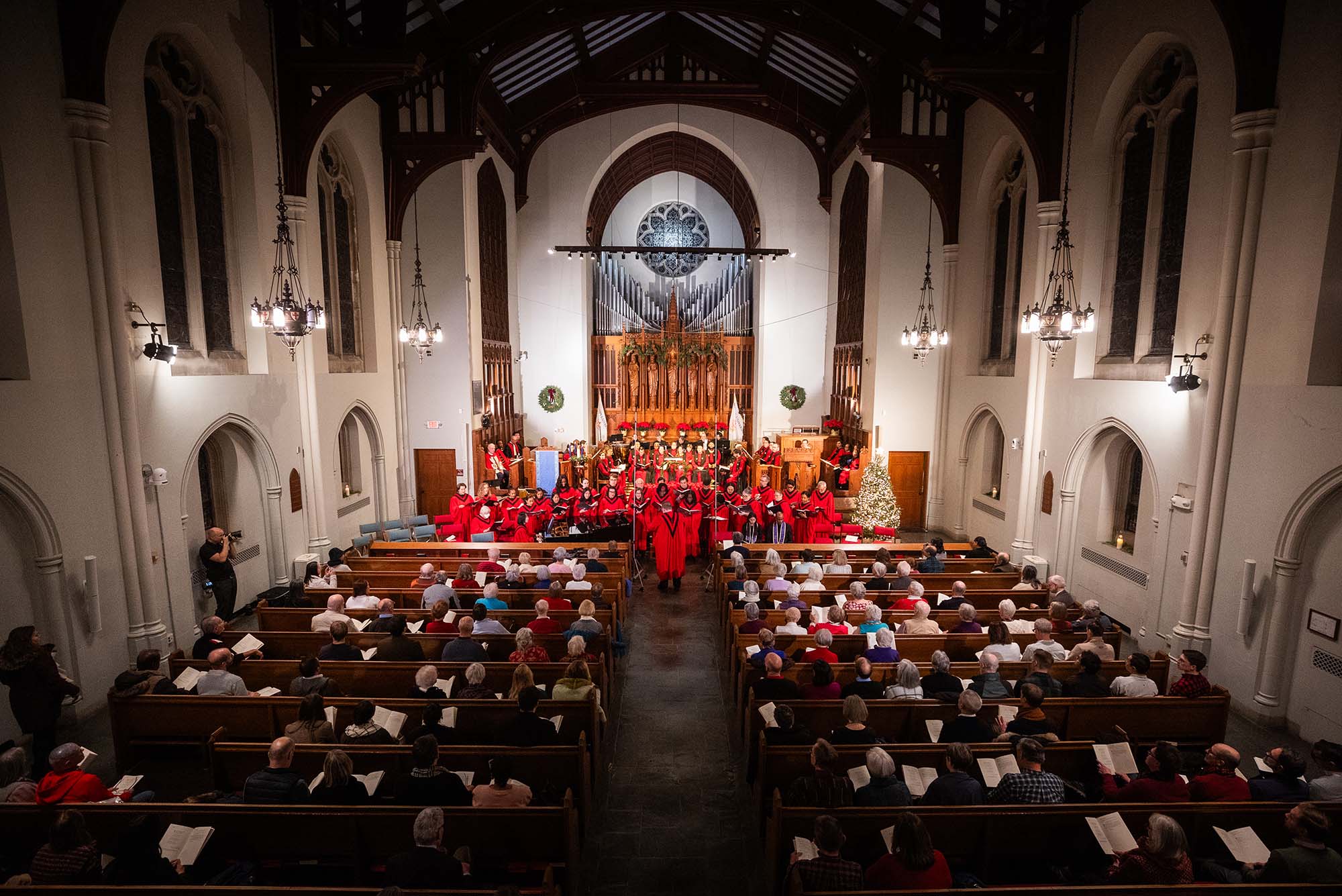 Photo: A holiday service at BU Marsh Chapel, with a performance from the choir on the main stage.