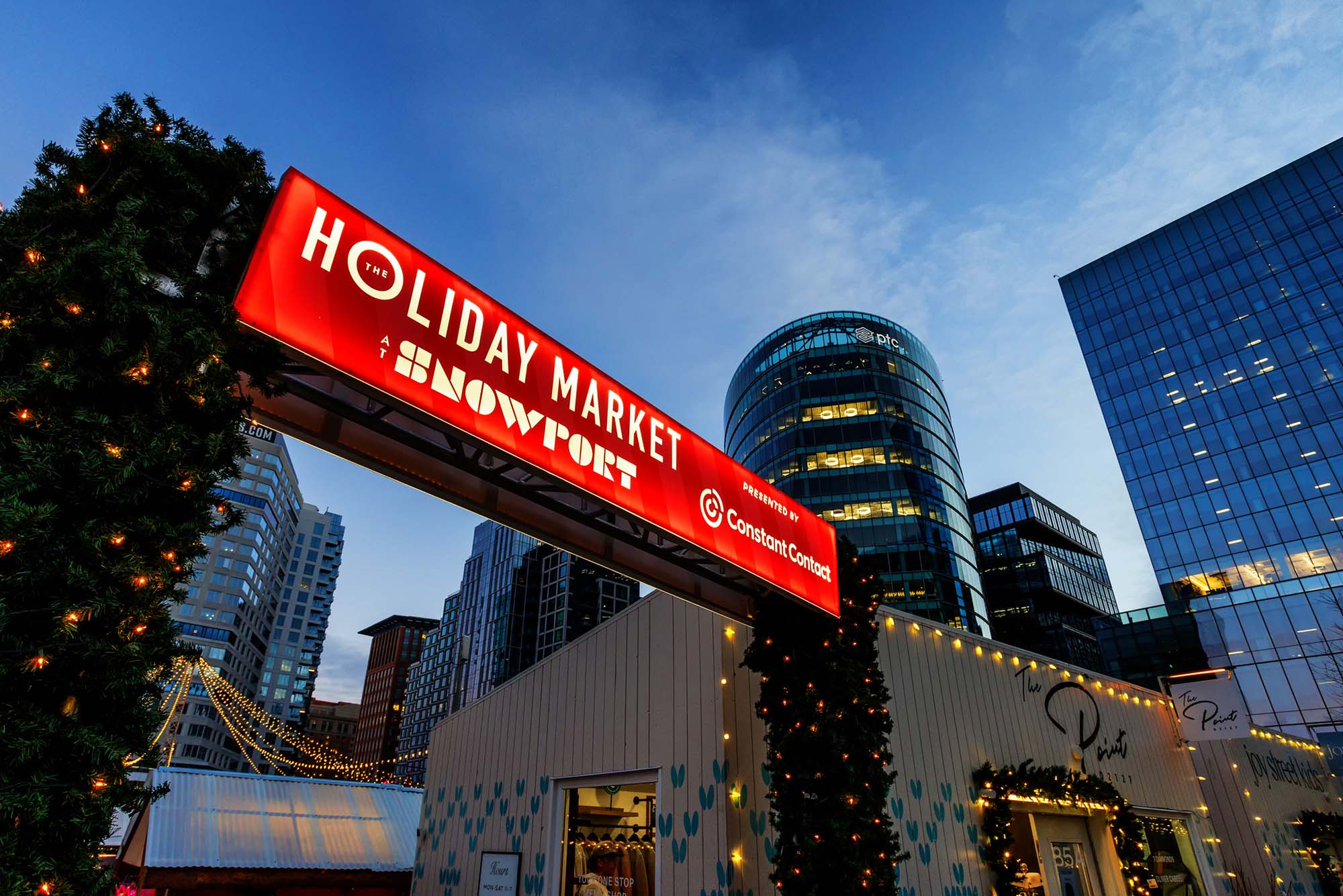 Photo: The Holday Market at Snowport with a sign leading to the entrance