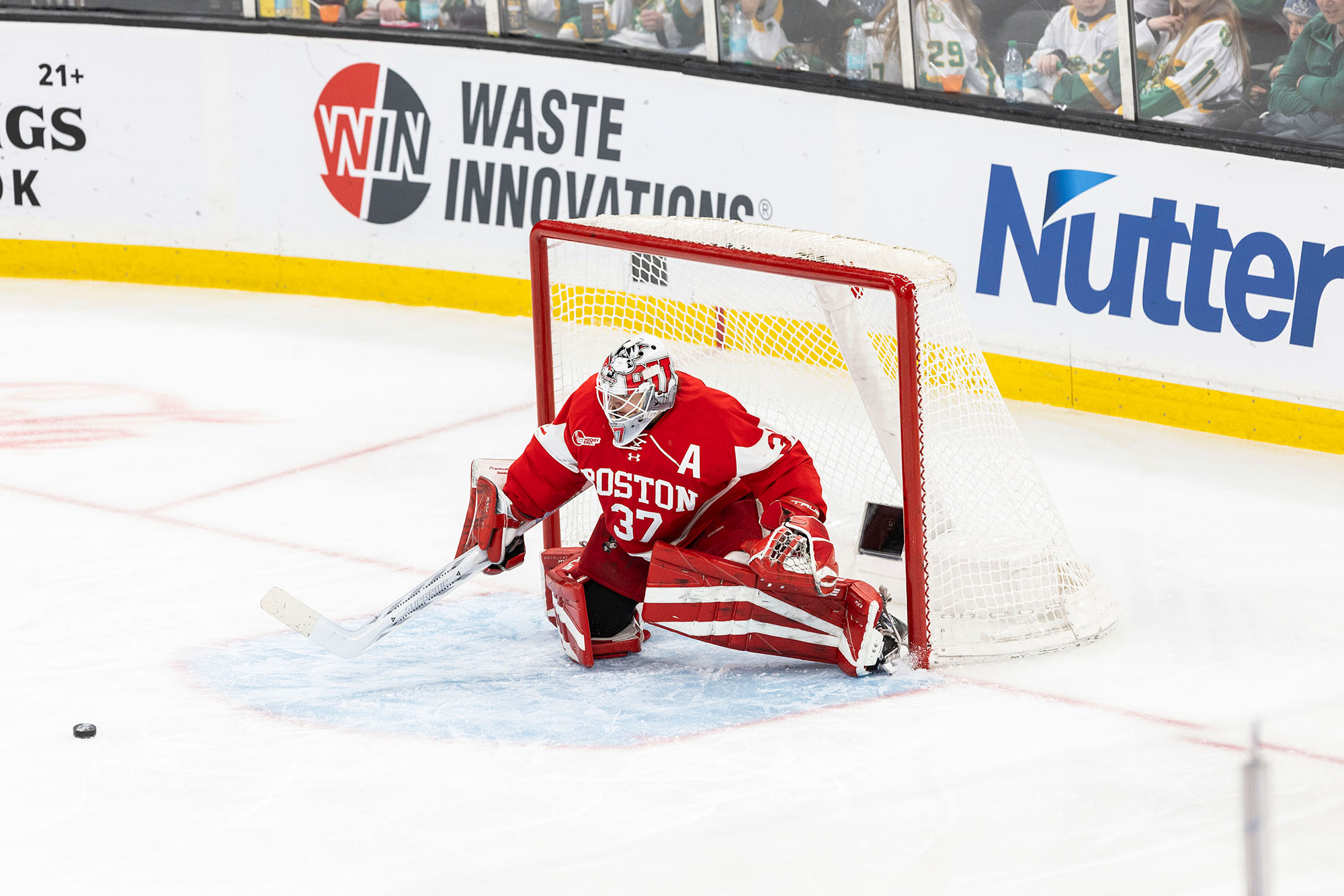 Shanahan stopping a puck during the Women’s Beanpot Championship gameJanuary 21, 2025, at TD Garden. She helped lead the BU women’s ice hockey team to back-to-back Beanpot championship game appearances. Photo by Matt Woolverton/BU Athletics