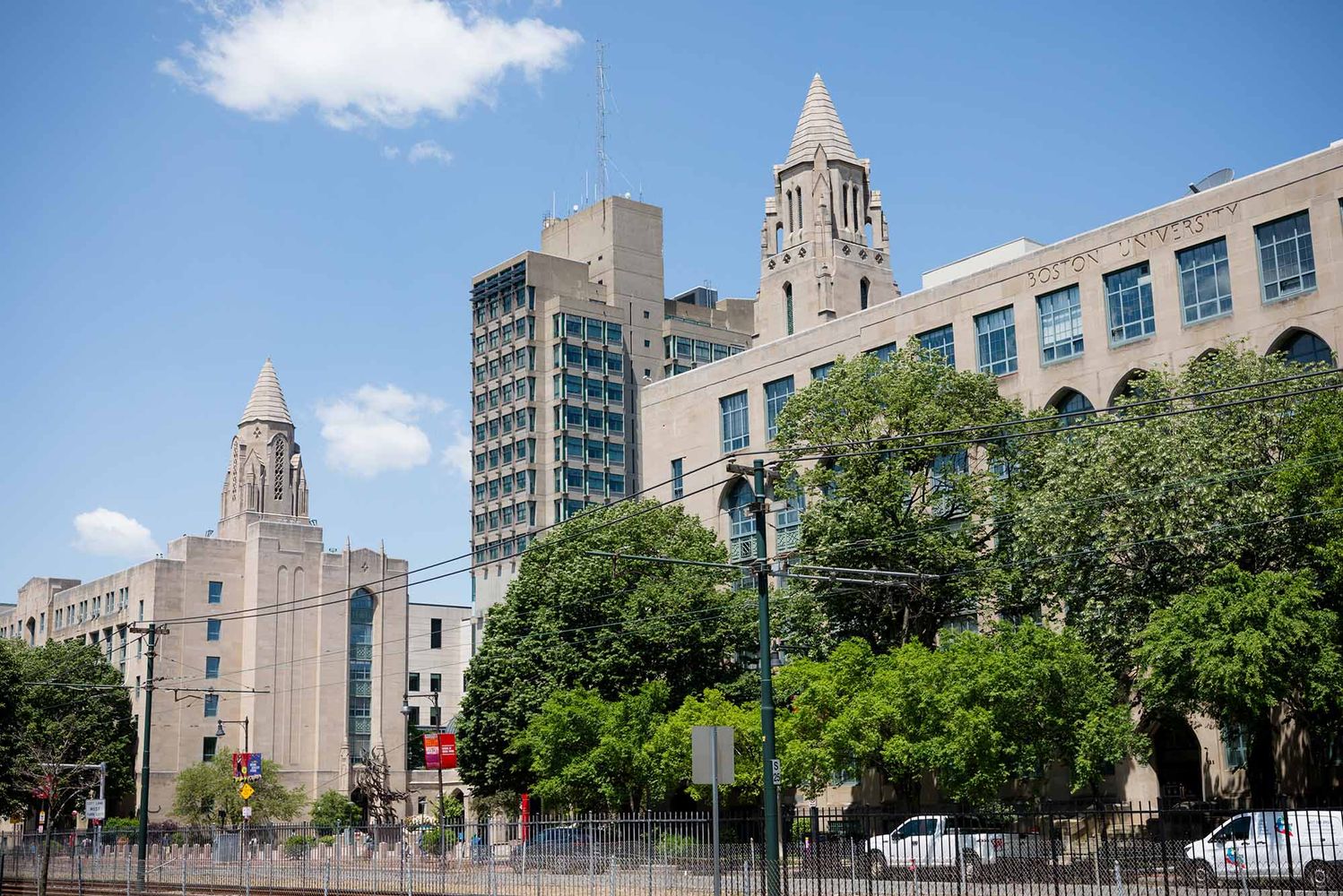 Photo: A stock image of Boston University's campus with bright blue skies and greenery.