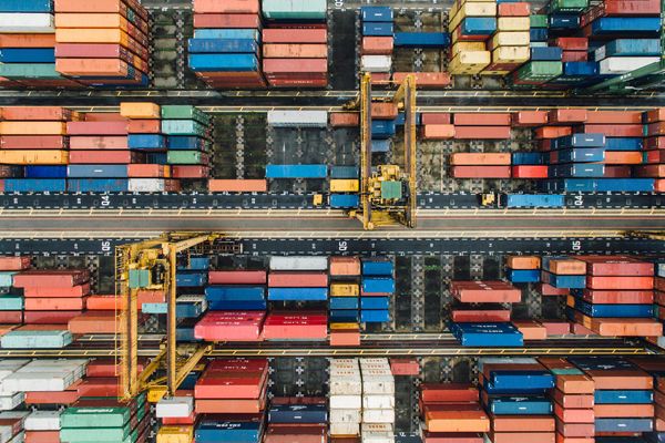 Photo: Aerial picture of a pile of enclosed shipping containers