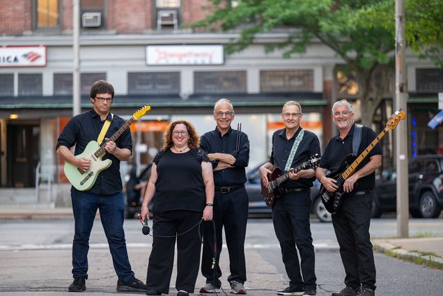 Photo: The band Ronona J posing on the streets of Natick