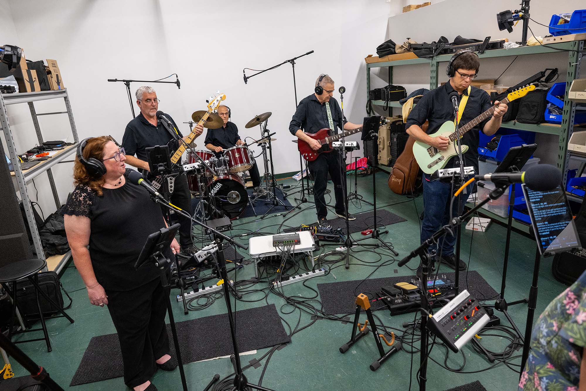 Photo: The band Ronona J practicing with their instruments in their rehearsal space in Natick, MA