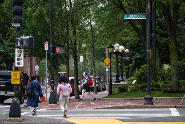 Photo: A shot of BU's campus with a few students walking around.