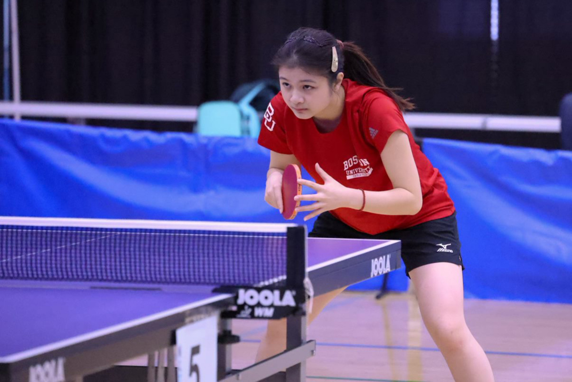 Photo: Emily Tan of the BU table tennis team during a game