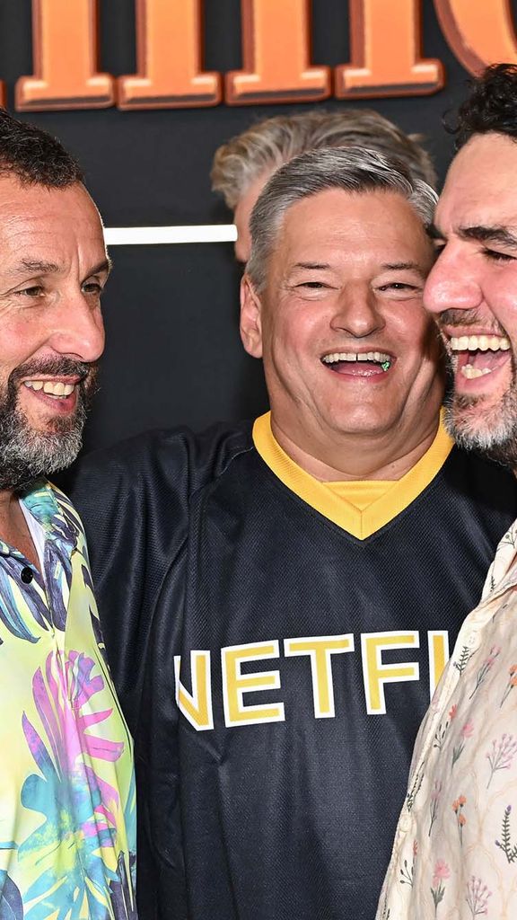 Adam Sandler, left, Ted Sarandos, and BU alum Benny Safdie attend the premiere of Netflix’s “Happy Gilmore 2” on Monday, July 21, 2025, in New York. Photo by Evan Agostini/Invision/AP