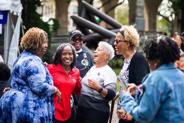 Photo: A group of older women celebrating their alumni weekend at BU.