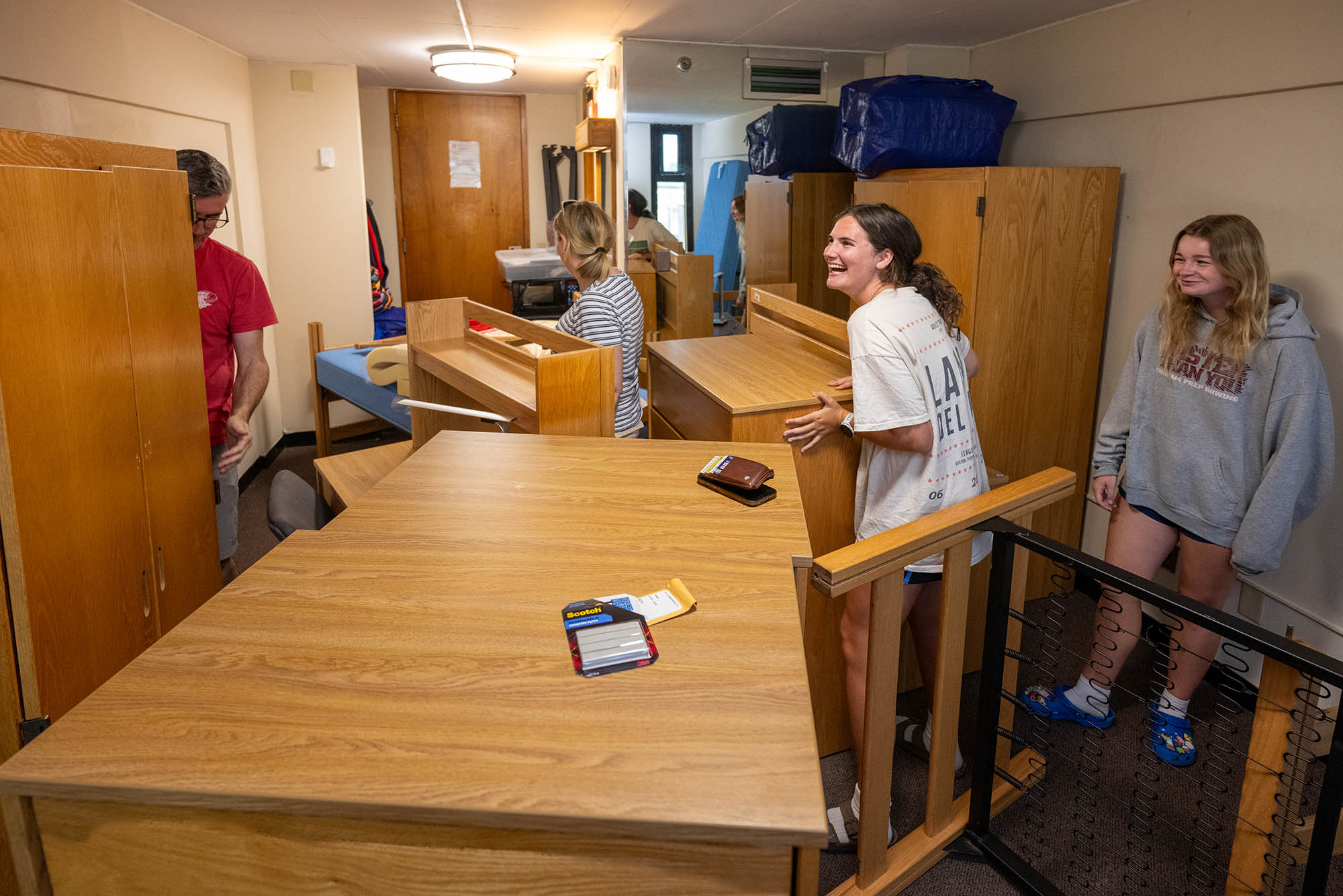 Photo: A couple of students with their parents moving into a BU dorm.