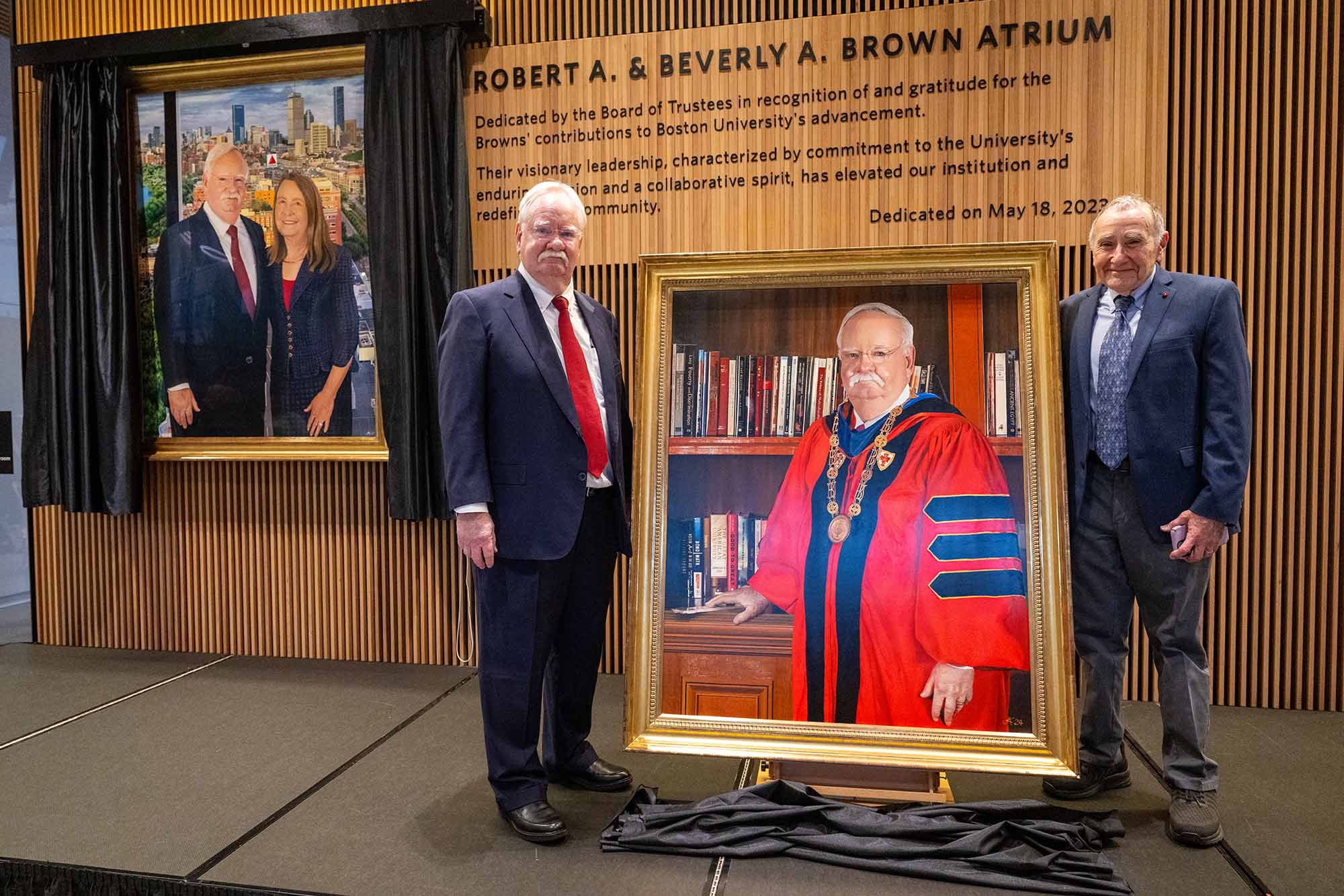 Photo: Former President of Boston University poses next to his new portrait painted by Jon Friedman, who poses on the right.
