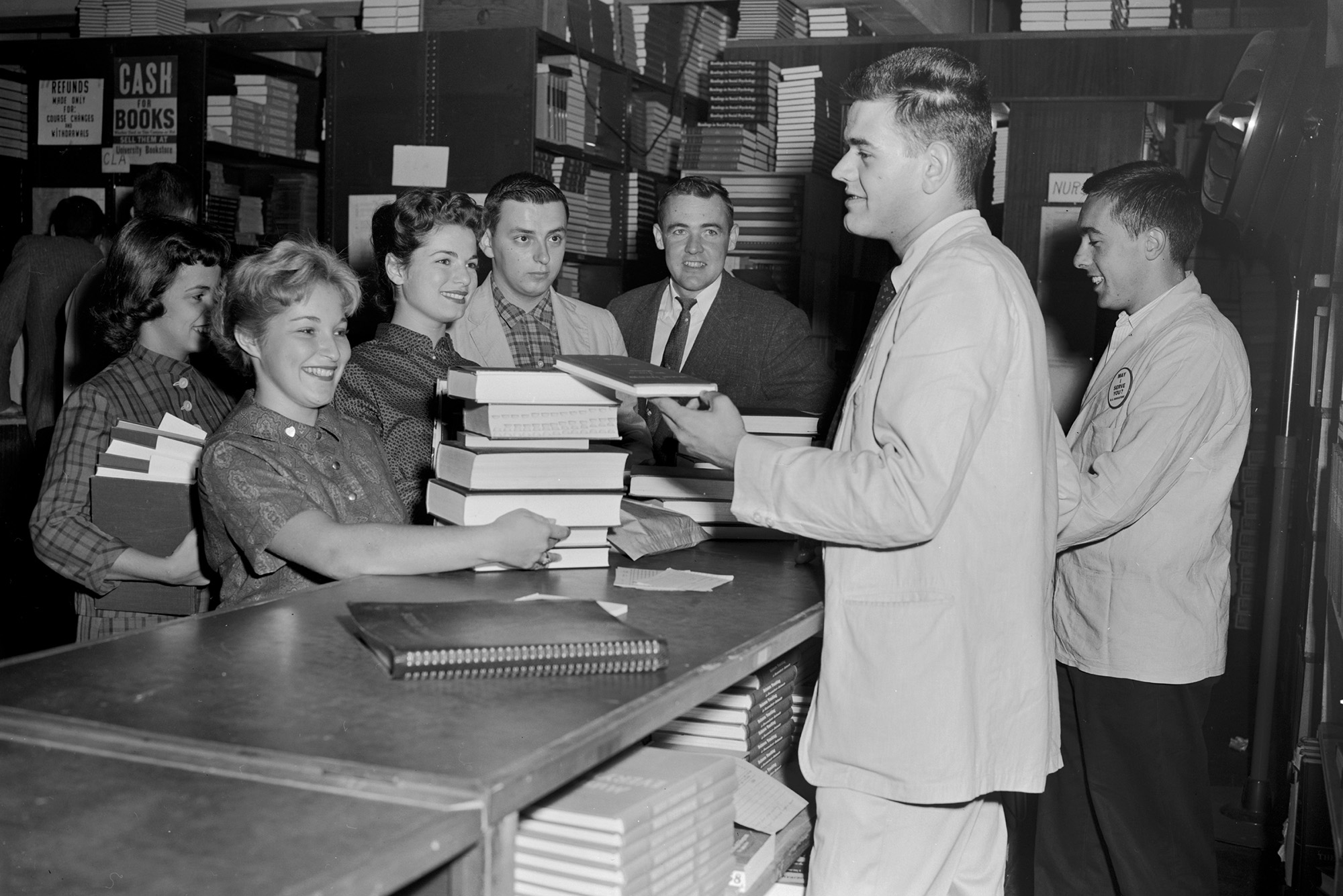 Photo: A black-and-white photo of Boston University students buying & selling books at the bookstore in 1958
