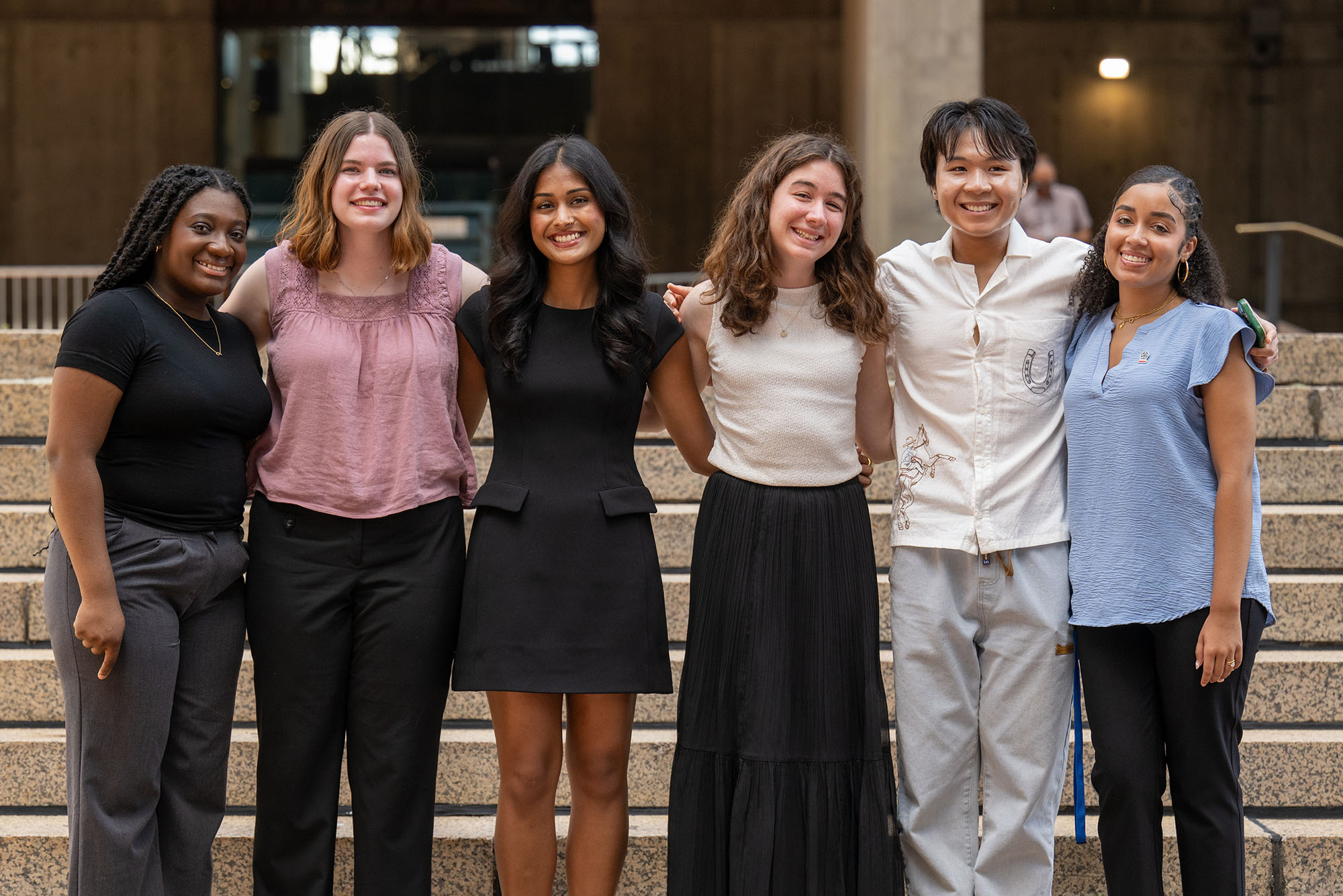 Some of this year’s BU City Scholar Summer Fellows on City Hall Plaza, August 12: Mickayla Davis (CAS’27) (from left), Gretta Healy (CGS’25, CAS’27), Maisha Kazi (CAS’26), Maggie Olson (CAS’26, Pardee’26), Khang Le (CAS’26), and Carina Spinola (Sargent’26); not pictured: Kimberly Nguyen (Sargent’27) and Zakariya Hussein (Questrom’27)