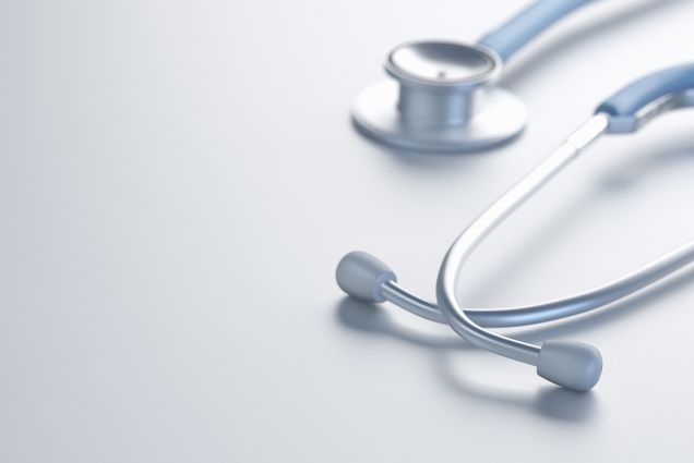 Photo: a stethoscope on a white background