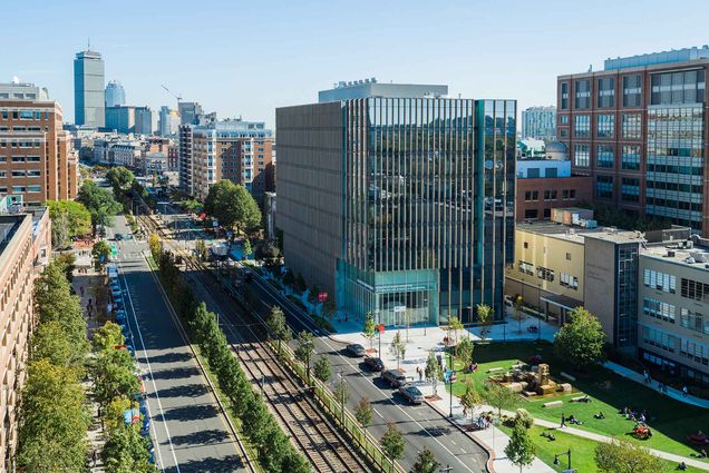Photo: A wide shot of Kilahchand Center, a boxy, all glass building on Boston University's campus.