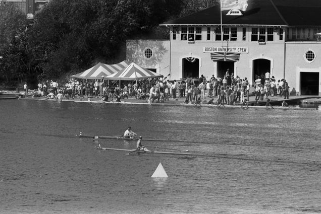 Photo: A black and white photo of Boston University's crew team on the Charles River in 1979.