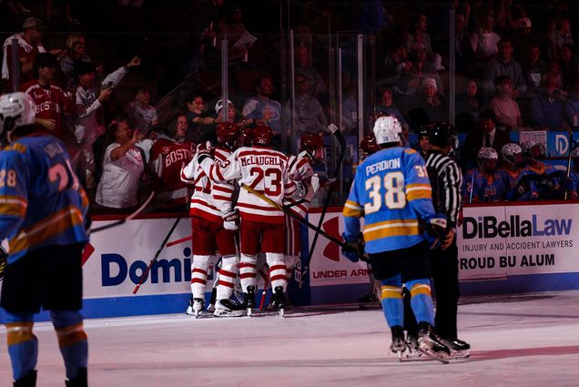 The BU men’s hockey team celebrates a goal against Long Island in their season home opener October 4 at Agganis Arena. The Terriers bested the Sharks 4-2. Photos by Eliza Nuestro, BU Athletics