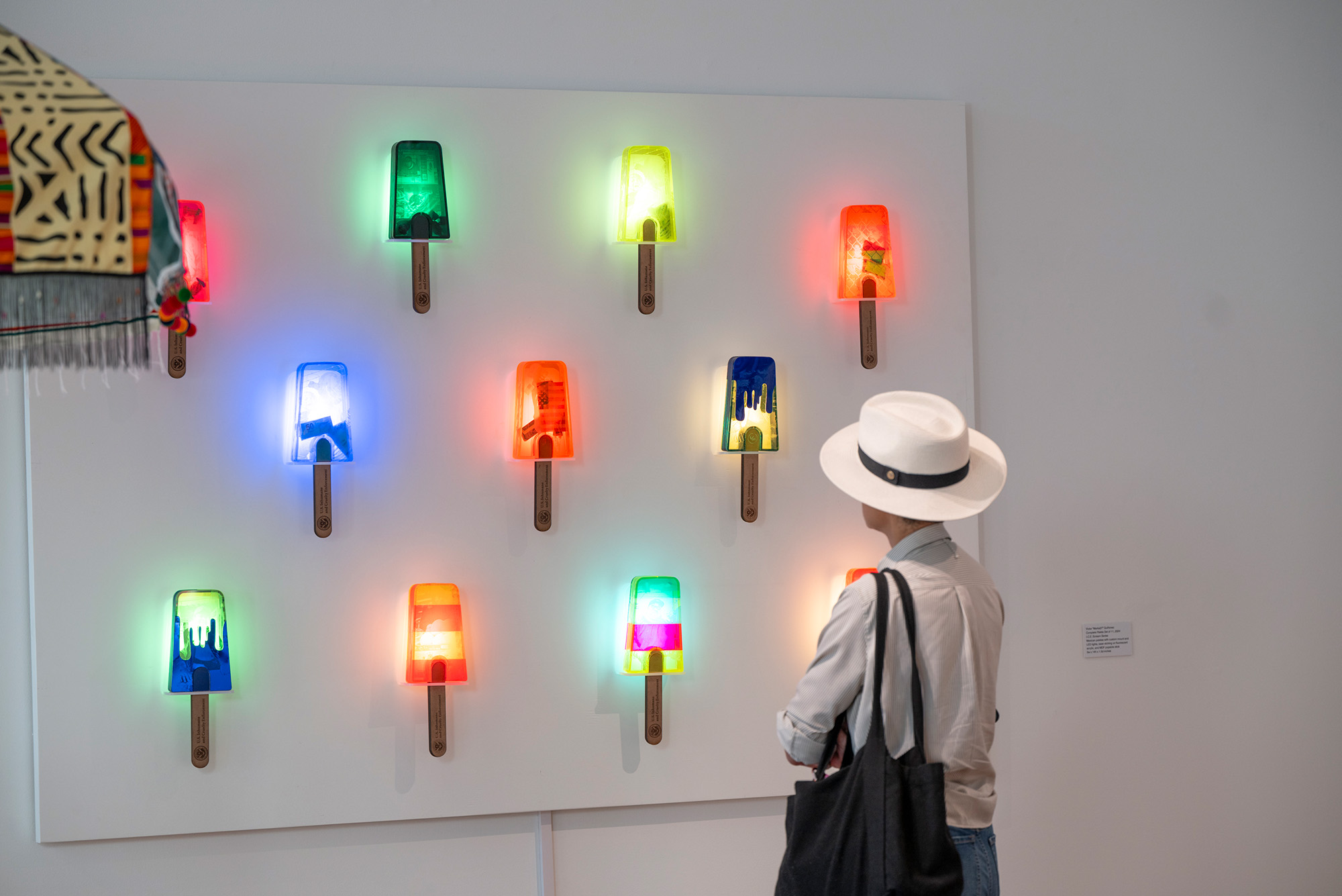 Photo: An art installation of neon-colored lit up ice cream cones