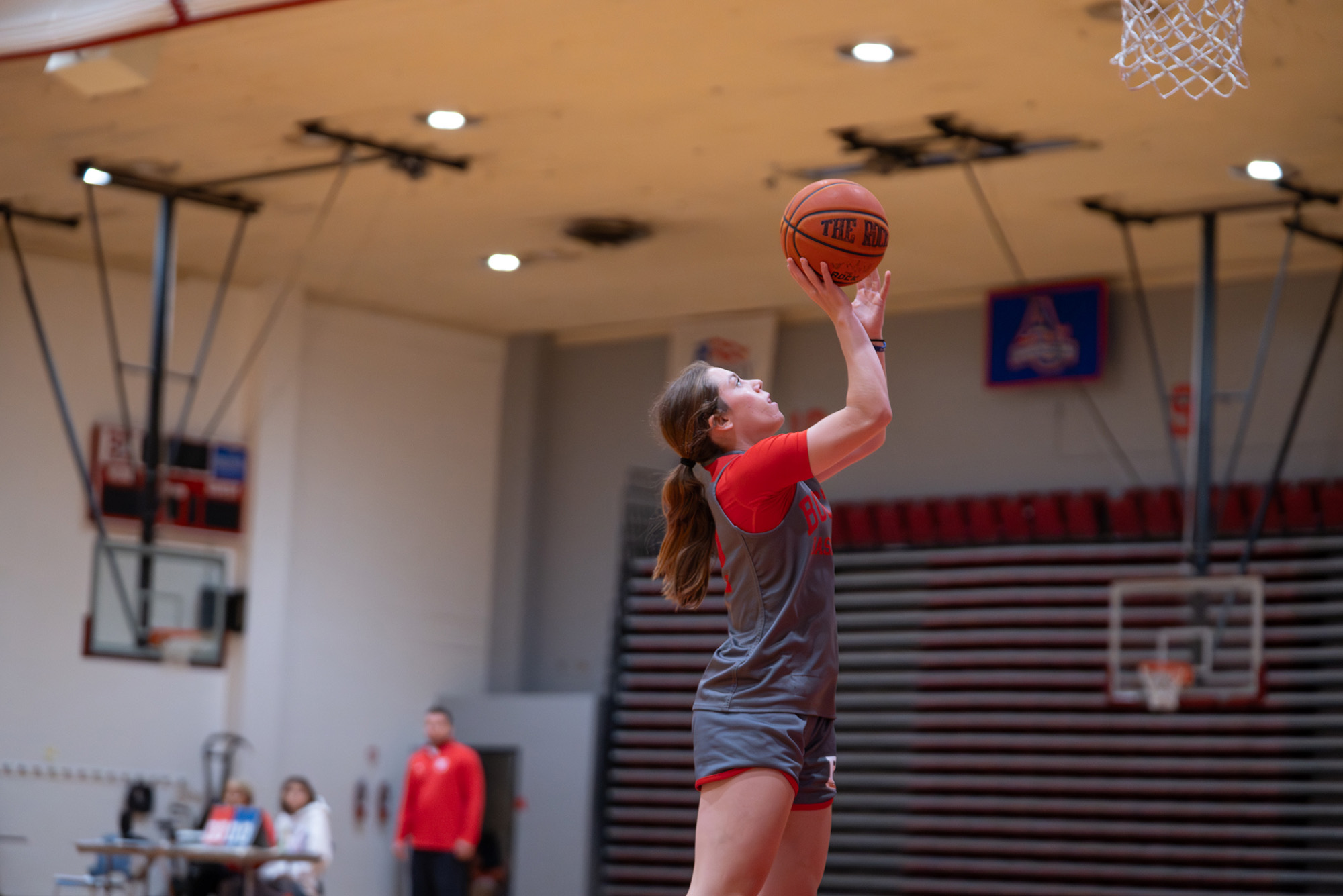 Photo: A BU women's basketball team member playing on the court during a game