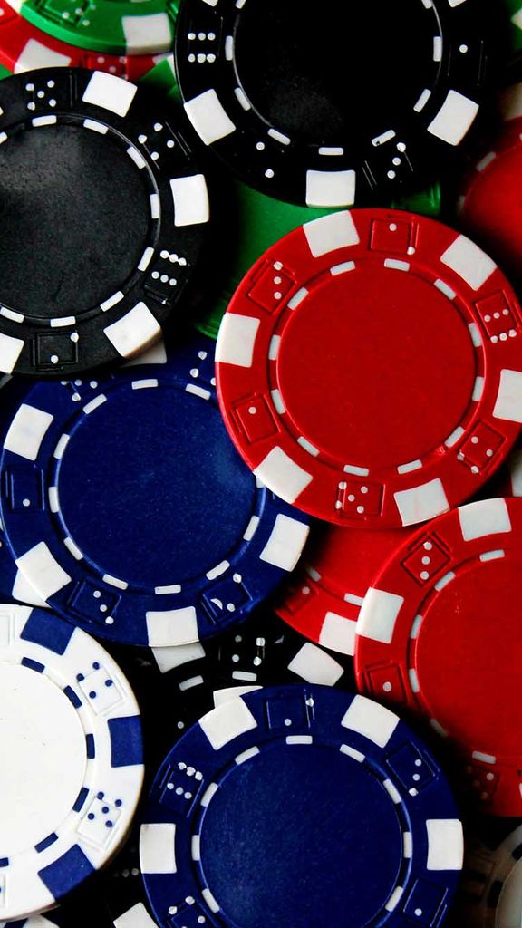 Photo: A flat lay image of generic gambling chips.