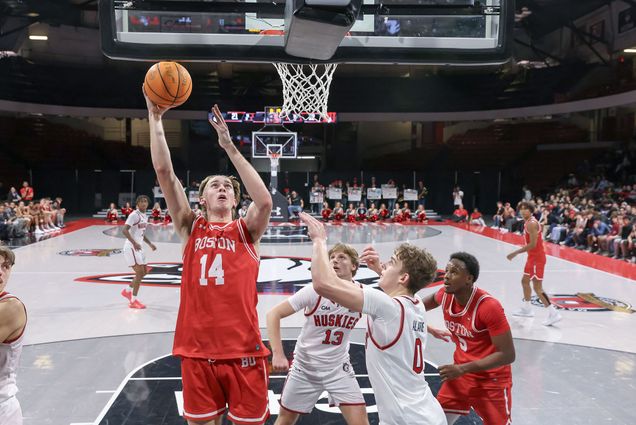 Photo: The BU men's basketball team playing on the court during a game