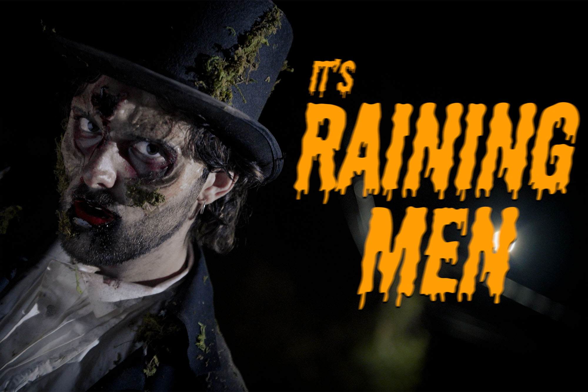 Photo: A cover image with a person dressed as a zombie on the left and orange text reading ITS RAINING MEN on the right.
