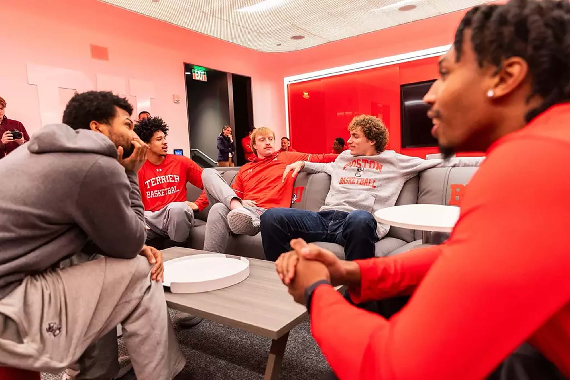 Photo: A candid shot of BU's basketball team in their new locker room.