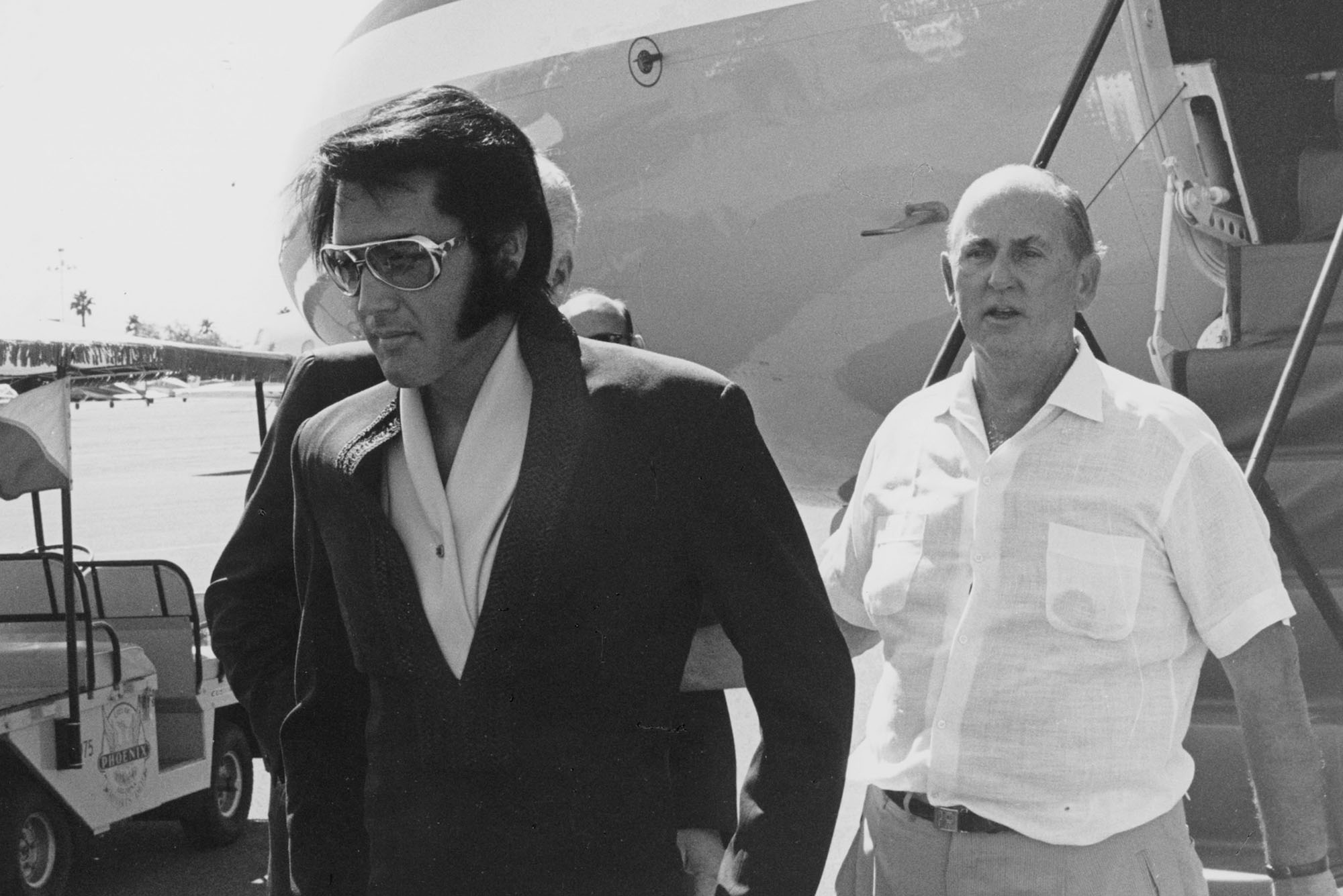 Photo: A black-and-white photo of Elvis Presley and Colonel Tom Parker in Phoenix for the King’s first 1970s tour