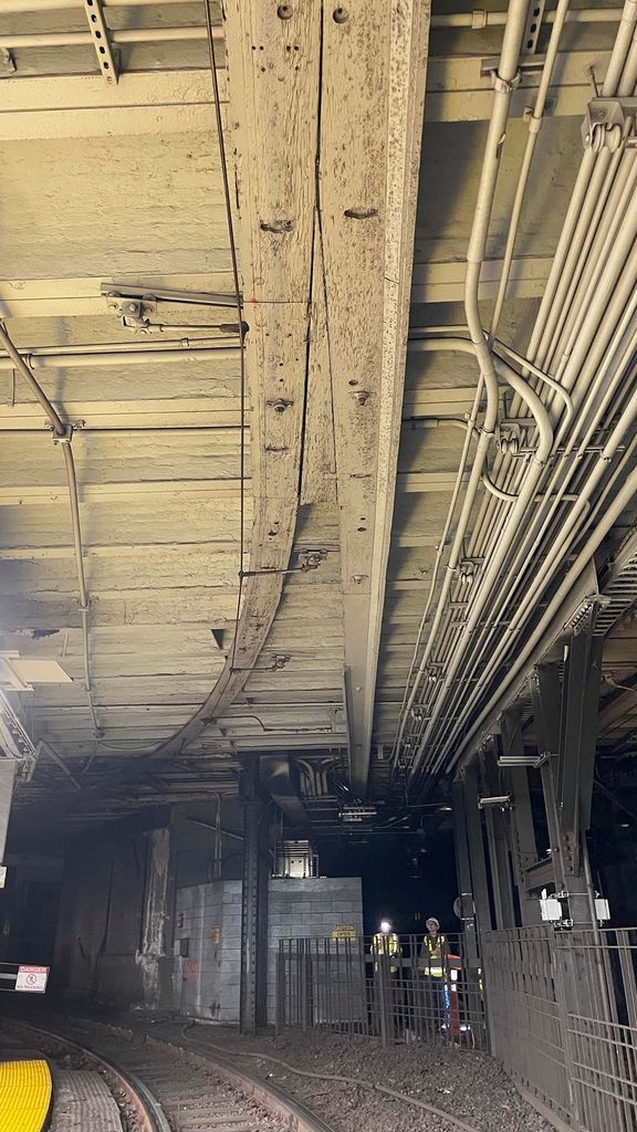 Photo: The inside of Park Street train station in Boston. Shown is a wooden overhead catenary trough that dates back to the 1890s