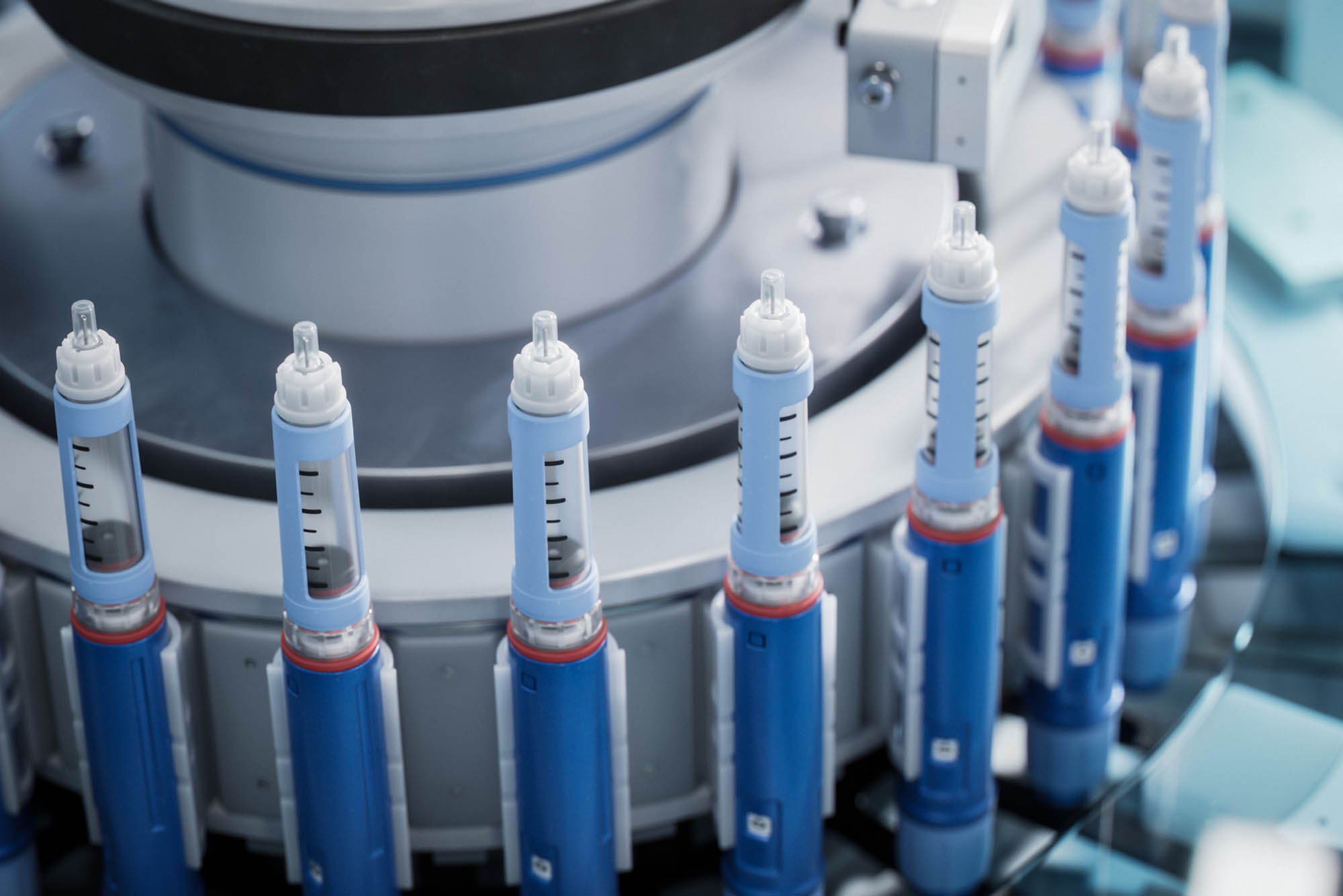 Photo: Stock image of GLP-1 medical injectors in a factory production line