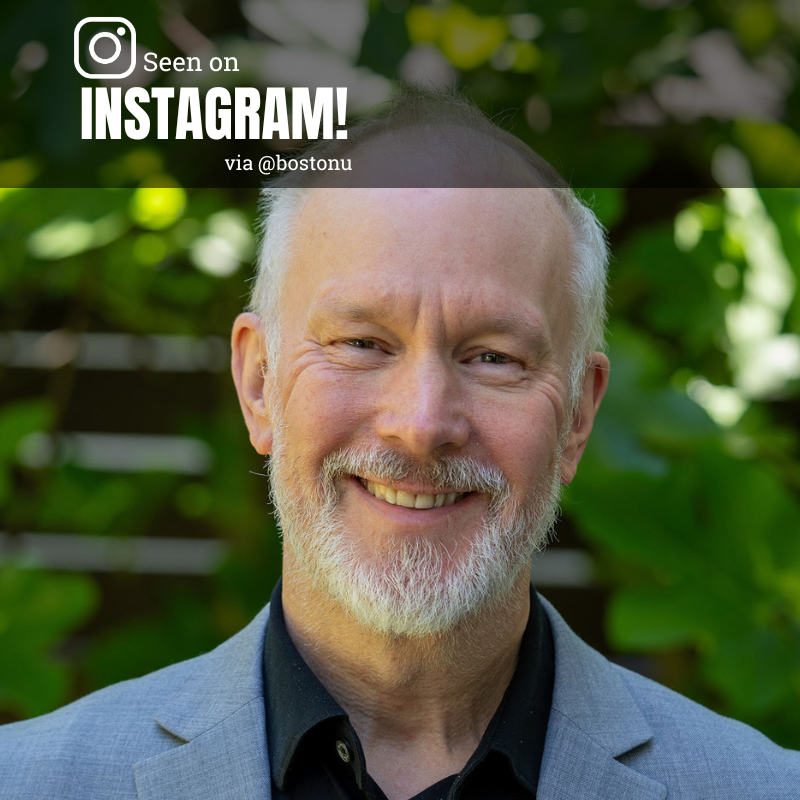 Photo: Colin Duckett, a white man with short hair, poses for a formal portrait