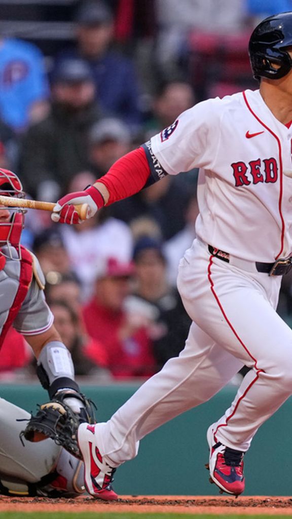 Photo: Boston Red Sox's Masataka Yoshida running after hitting the ball during a baseball game against the Philadelphia Phillies