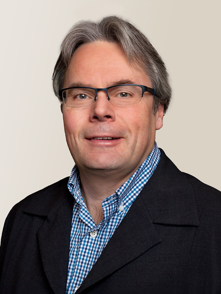 Photo: Formal headshot portrait of Marcel Rindisbacher