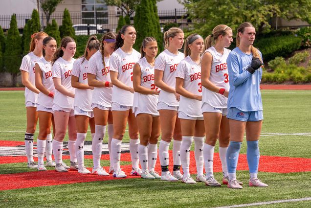 Photo: BU Women's Varsity Soccer Team in a line for the national anthem.