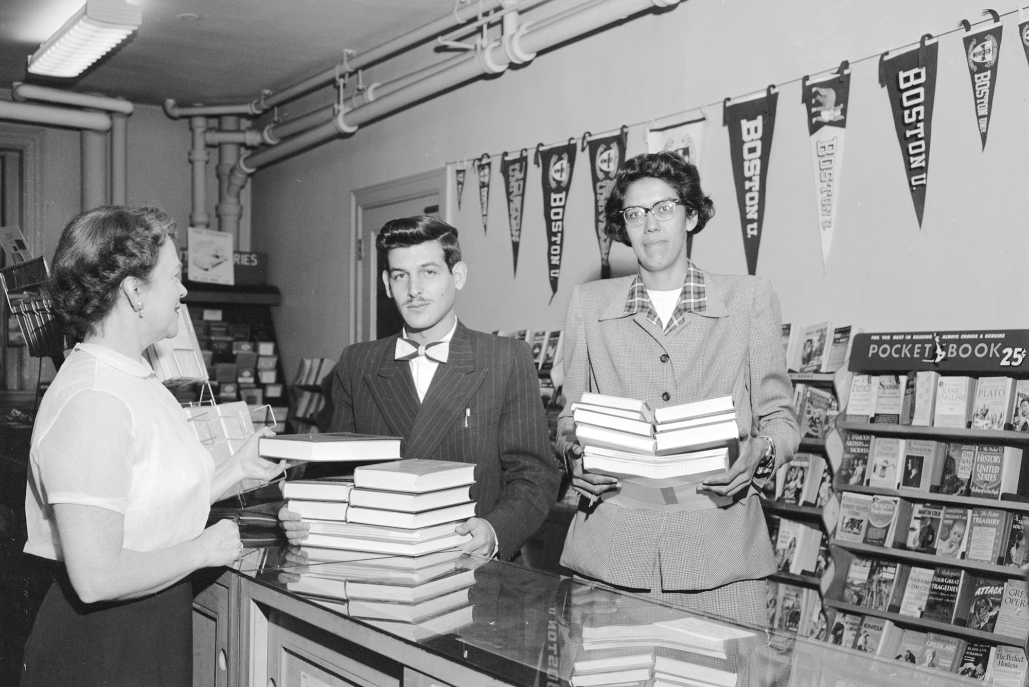 Photo: 1952 file photo of students buying books at a Boston University bookstore. One individual has a notable bowtie