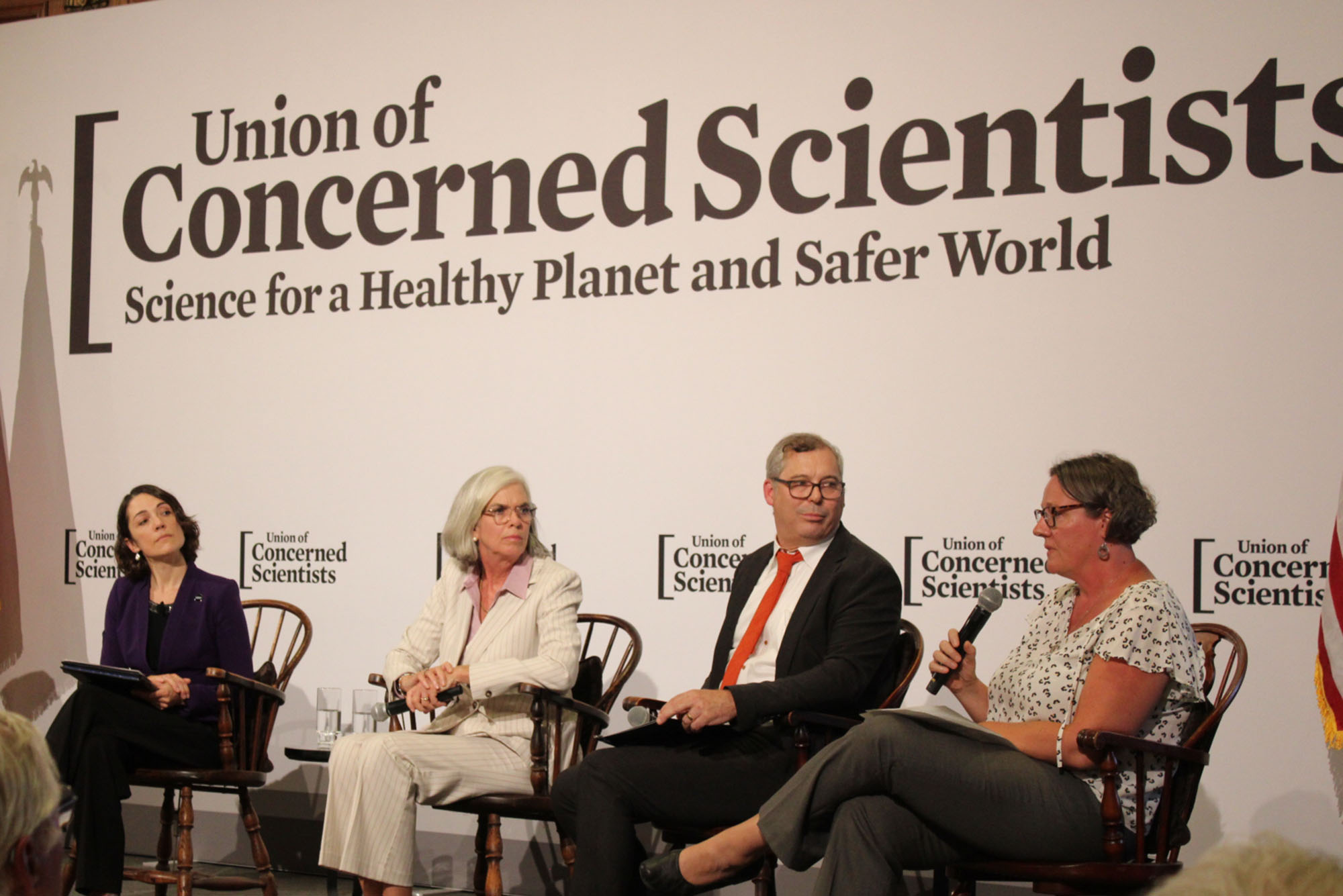 Jack Dennerlein, dean of BU’s Sargent College of Health & Rehabilitation (second from right) and Lucy Hutyra, College of Arts & Sciences distinguished professor of Earth & Environment (far right) took part in a Union of Concerned Scientists Town Hall featuring U.S. Representative Katherine Clark (D-MA) (center) in Arlington, MA, on September 8 to discuss how federal policies are impacting research, public health, innovation, and the scientific workforce. Also taking part in the discussion were Kirsten Ammons, MIT PhD candidate (far left) and Gretchen Goldman, Union of Concerned Scientists CEO (second from left). Photo by Jim Curley