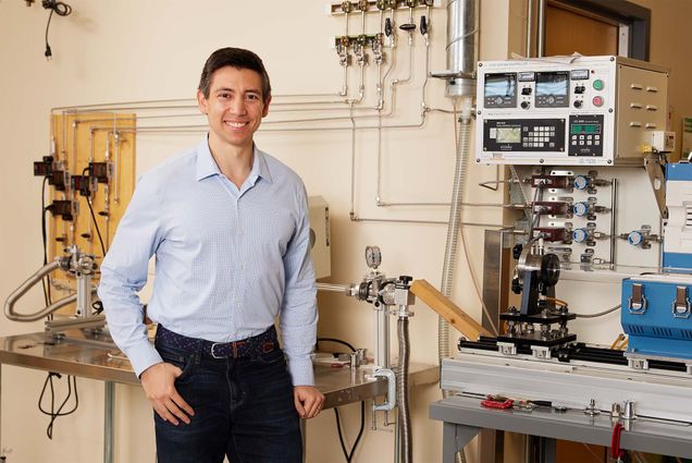 Photo: Sean Lubner poses in front of multiple machines