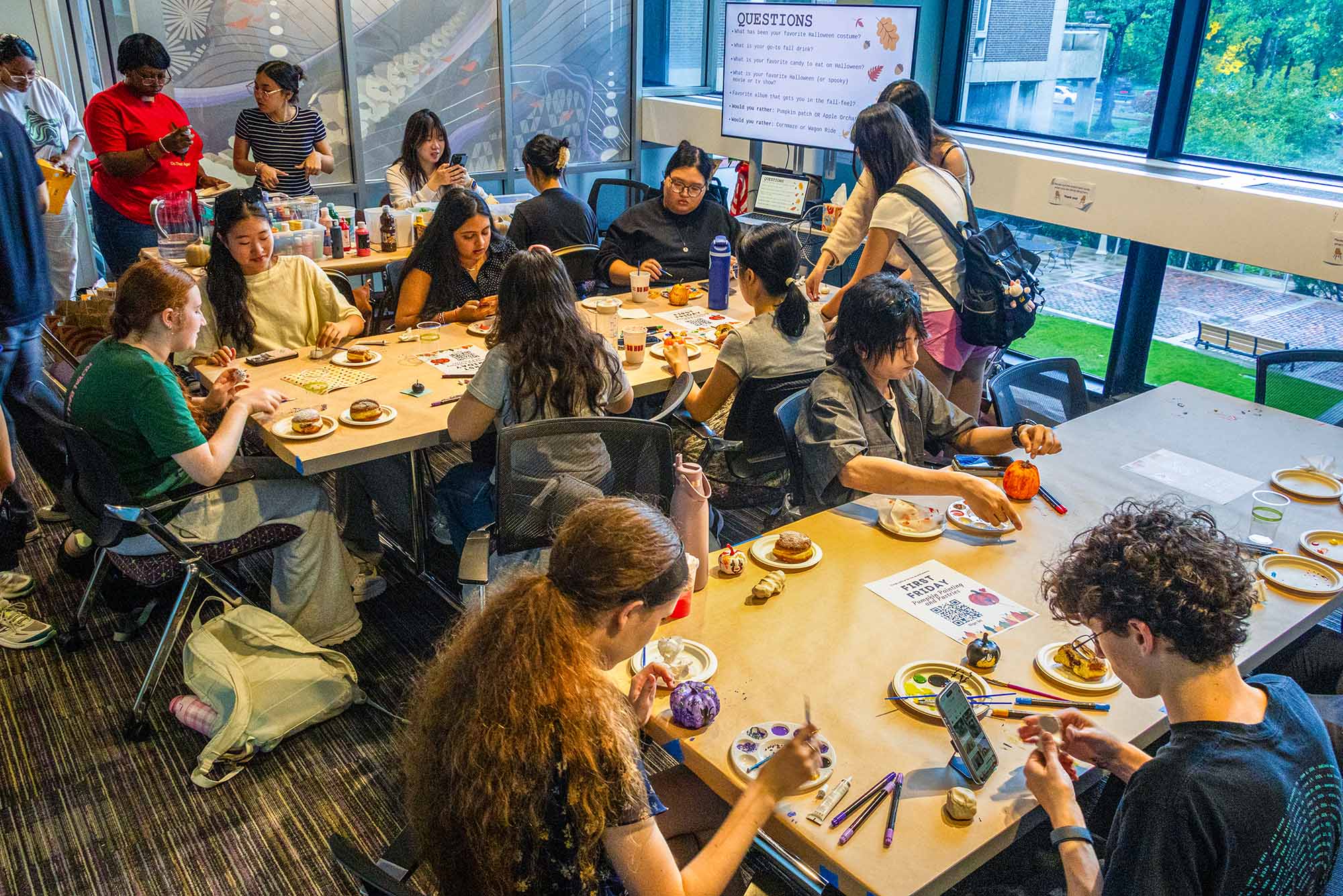 Photo: Students come together at BU's Office for the Arts' October First Fridays event: Pumpkin Painting and Pastries, held on Friday, October 2nd. Students had the chance to paint pastries, connect with their creativity, and snack on fresh, free pastries. Photo by Ajani Hickling (CAS'27)