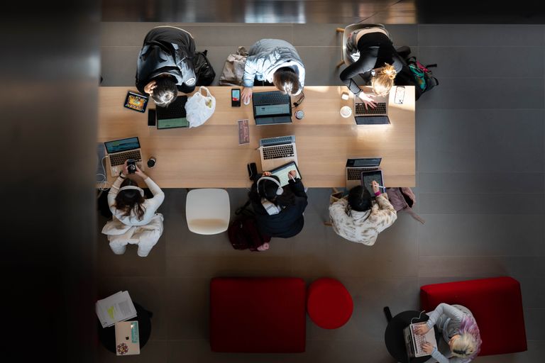 Students studying at table in Computing and Data Science Building