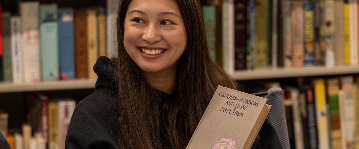 Gastronomy Student using the extensive library in the Food Studies department at 808 Commonwealth Avenue.